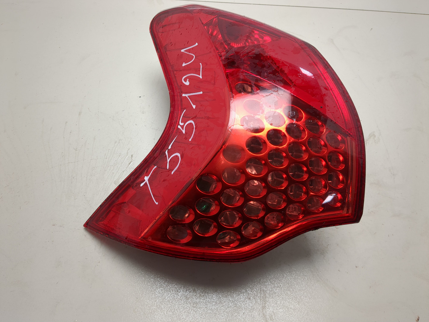 Фонарь задний левый