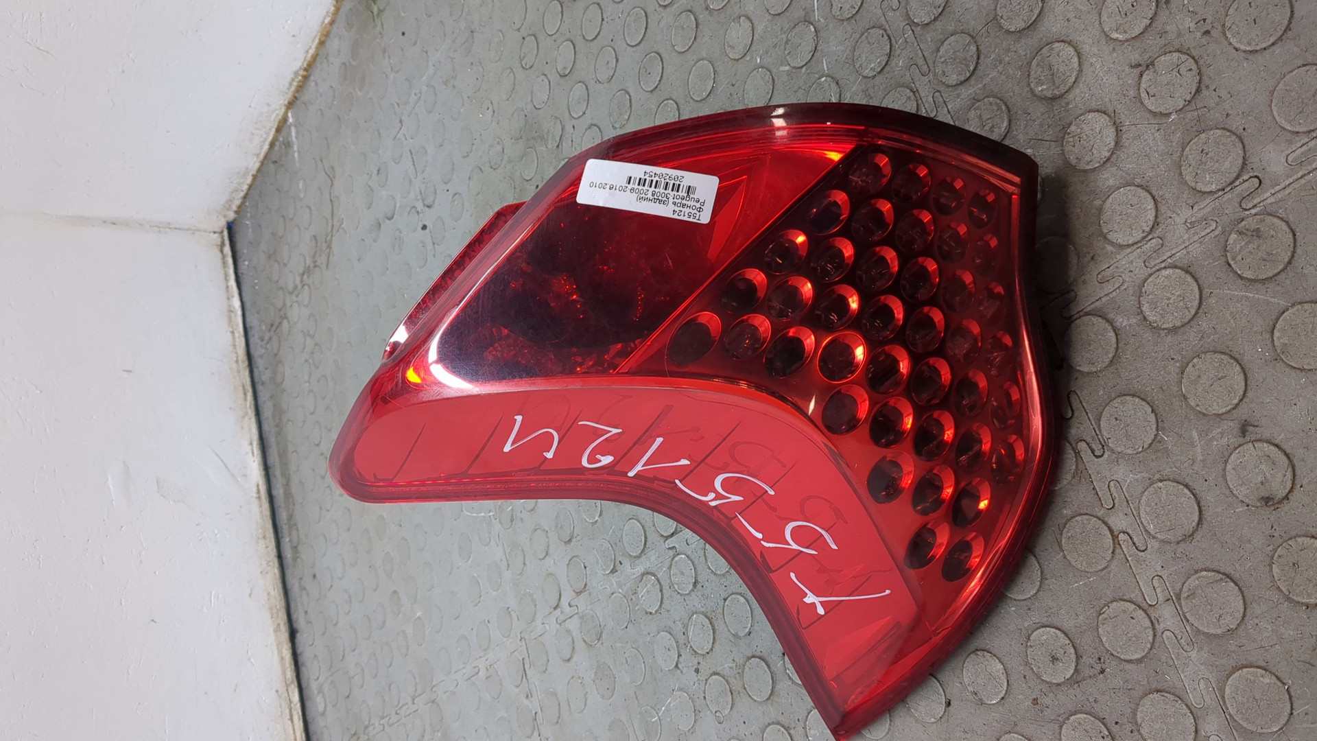 Фонарь задний левый