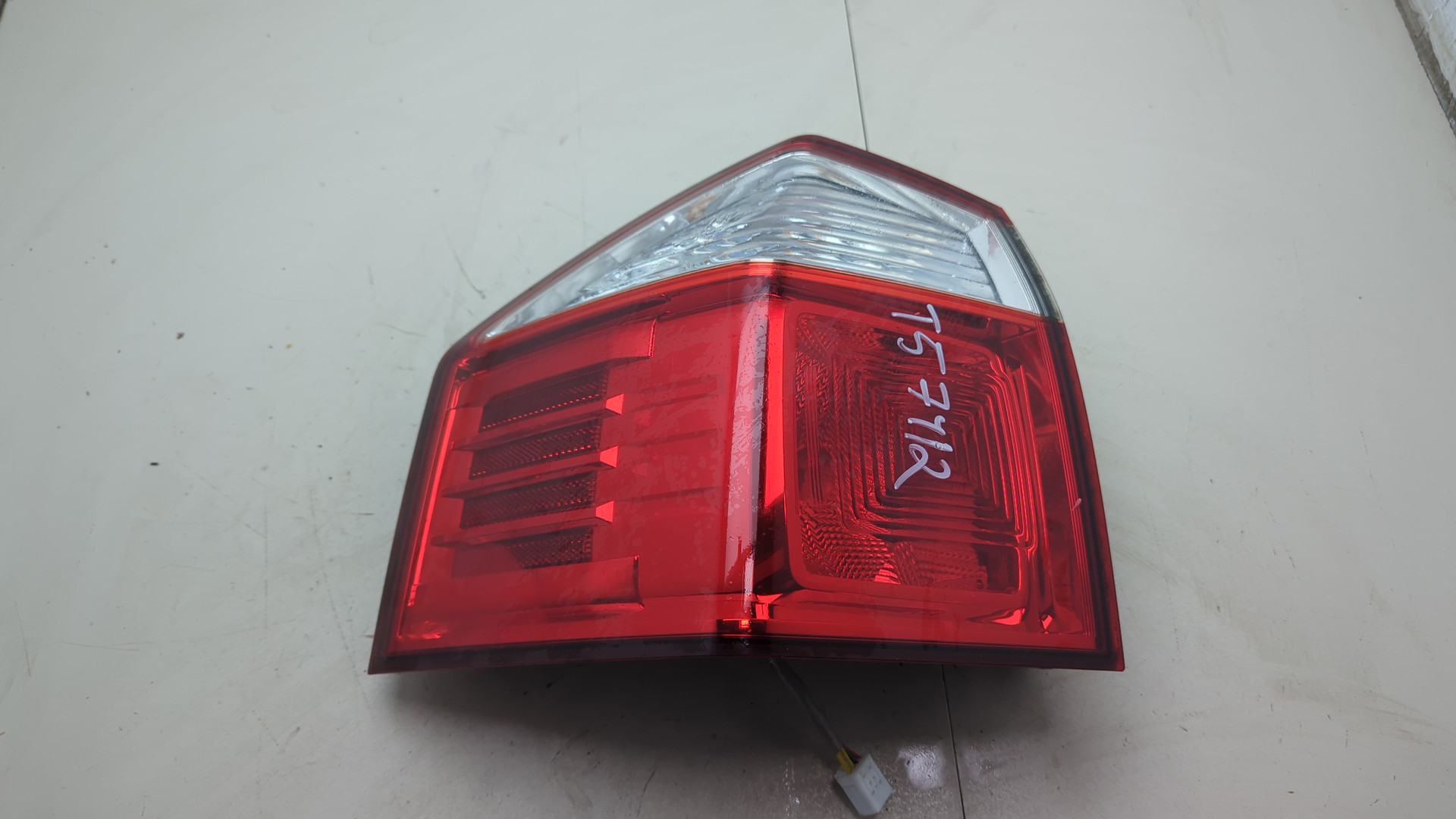 Фонарь задний левый