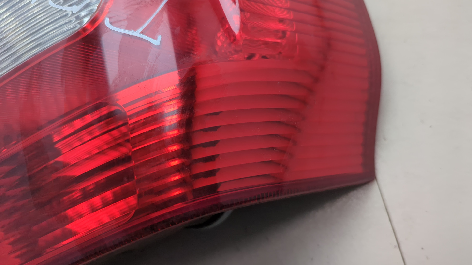 Фонарь задний левый