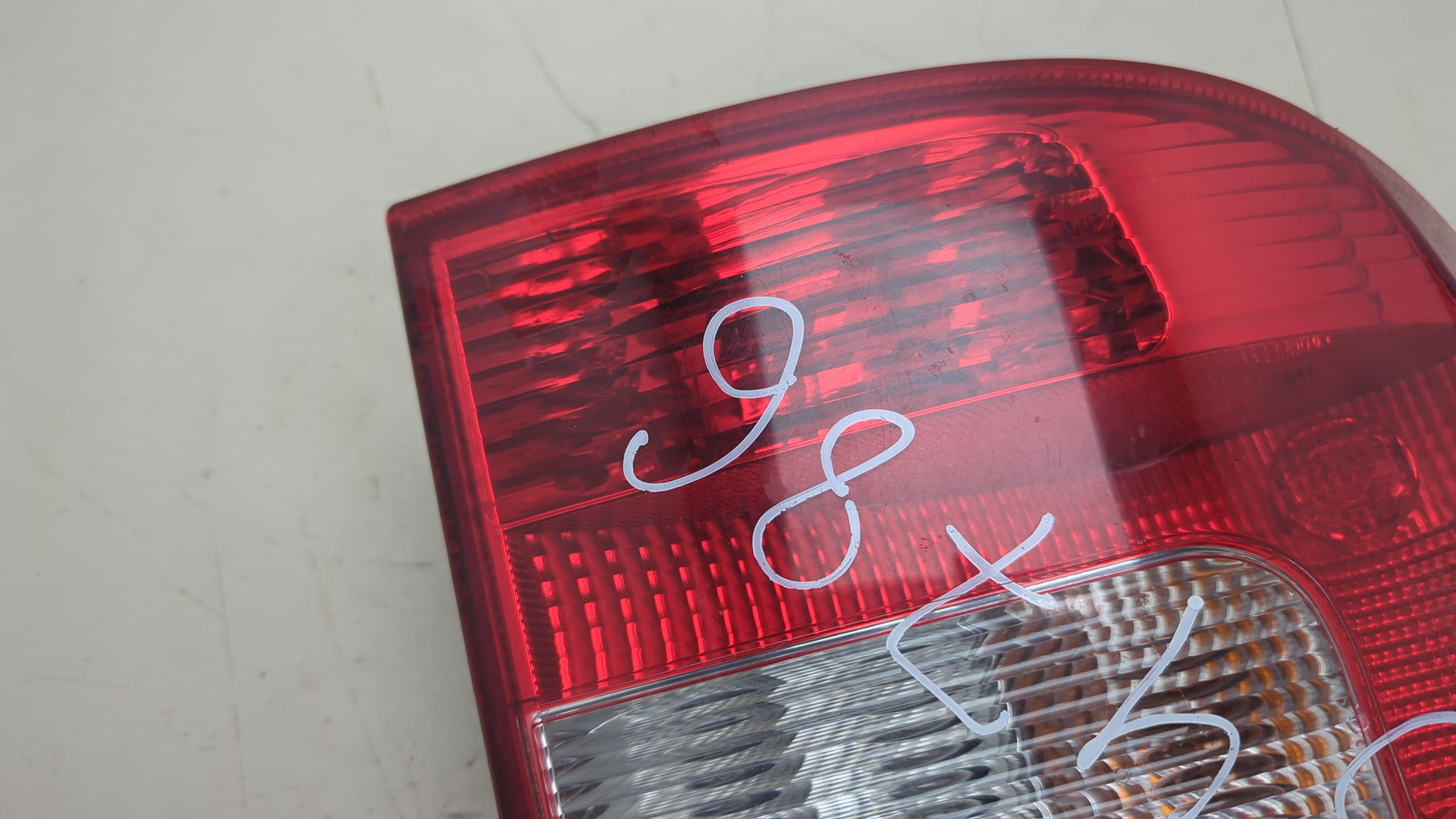 Фонарь задний левый