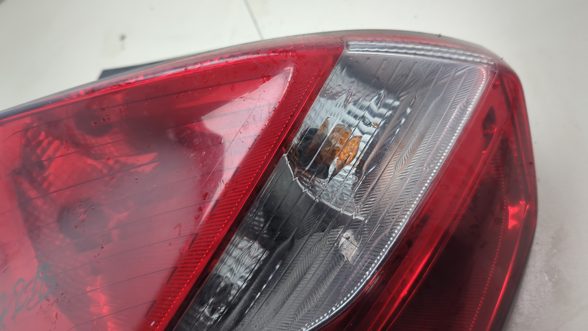 Фонарь задний левый