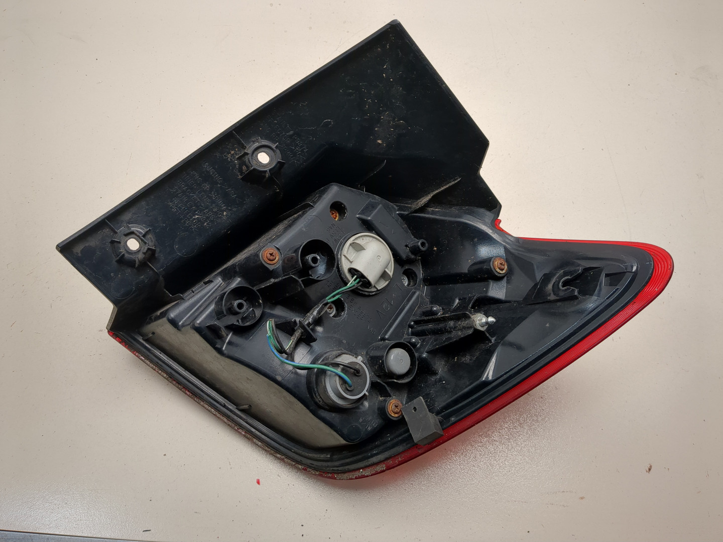 Фонарь задний левый