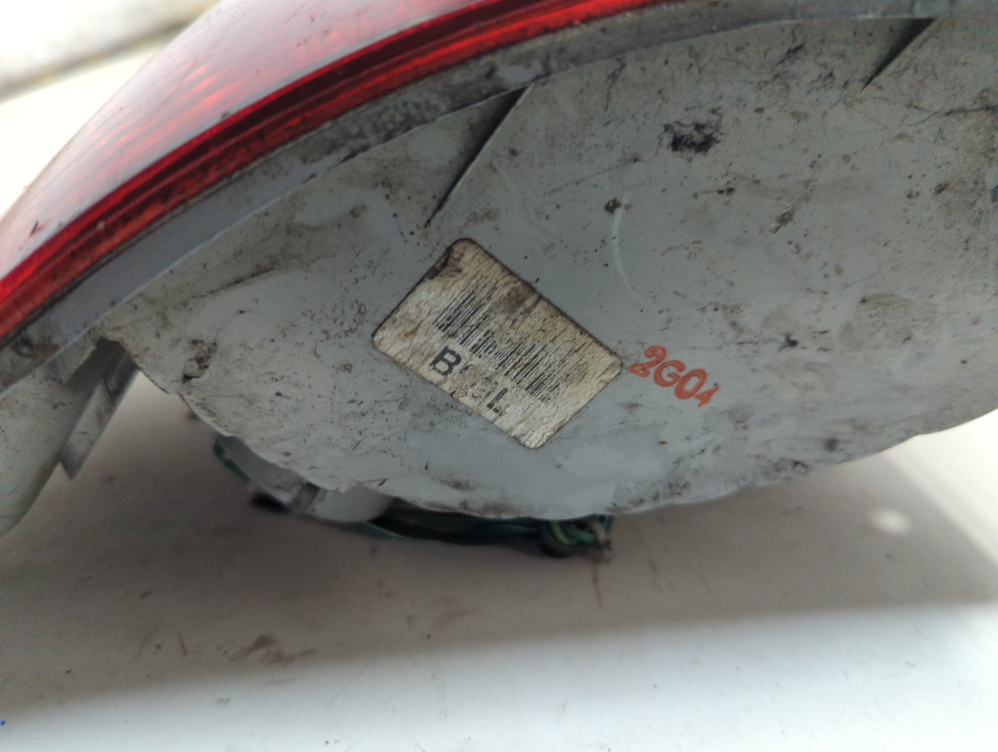 Фонарь задний левый