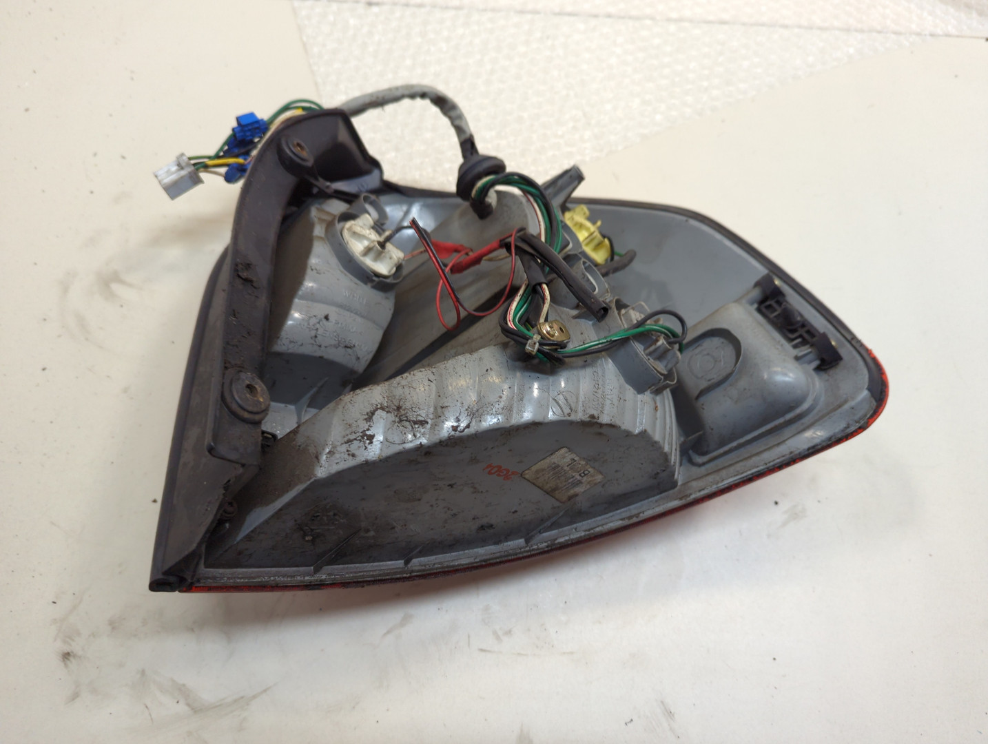 Фонарь задний левый