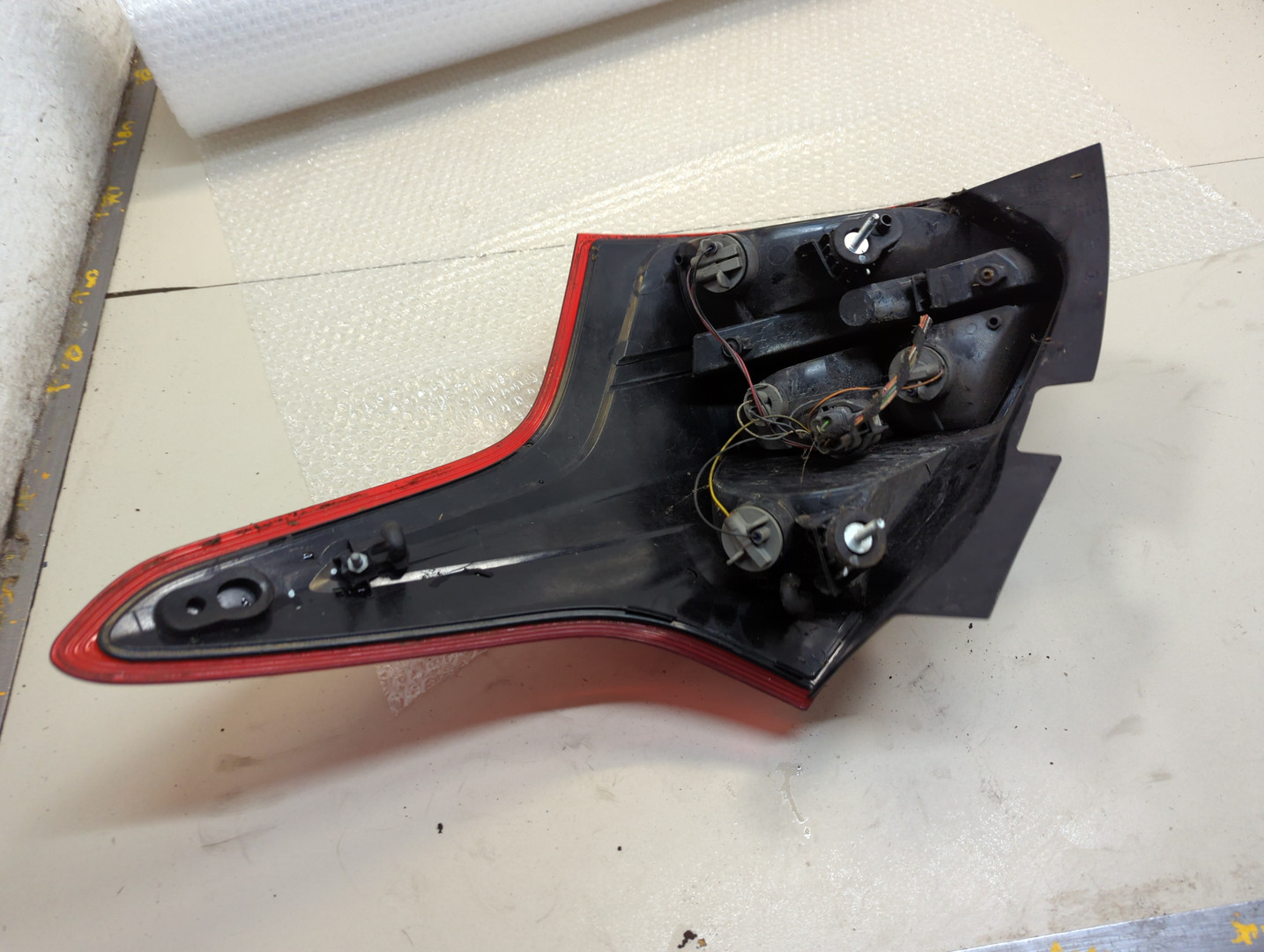 Фонарь задний левый