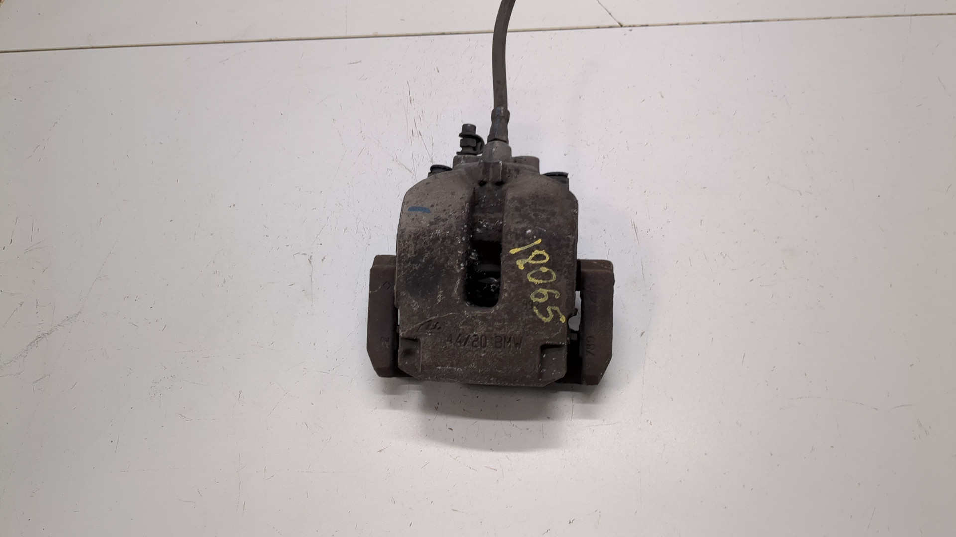 Суппорт задний левый