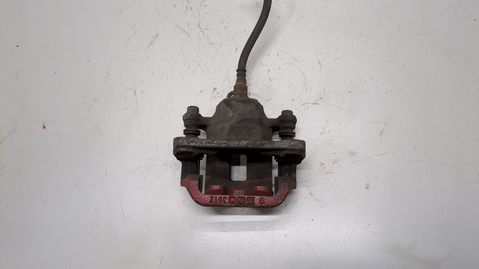 Суппорт задний левый