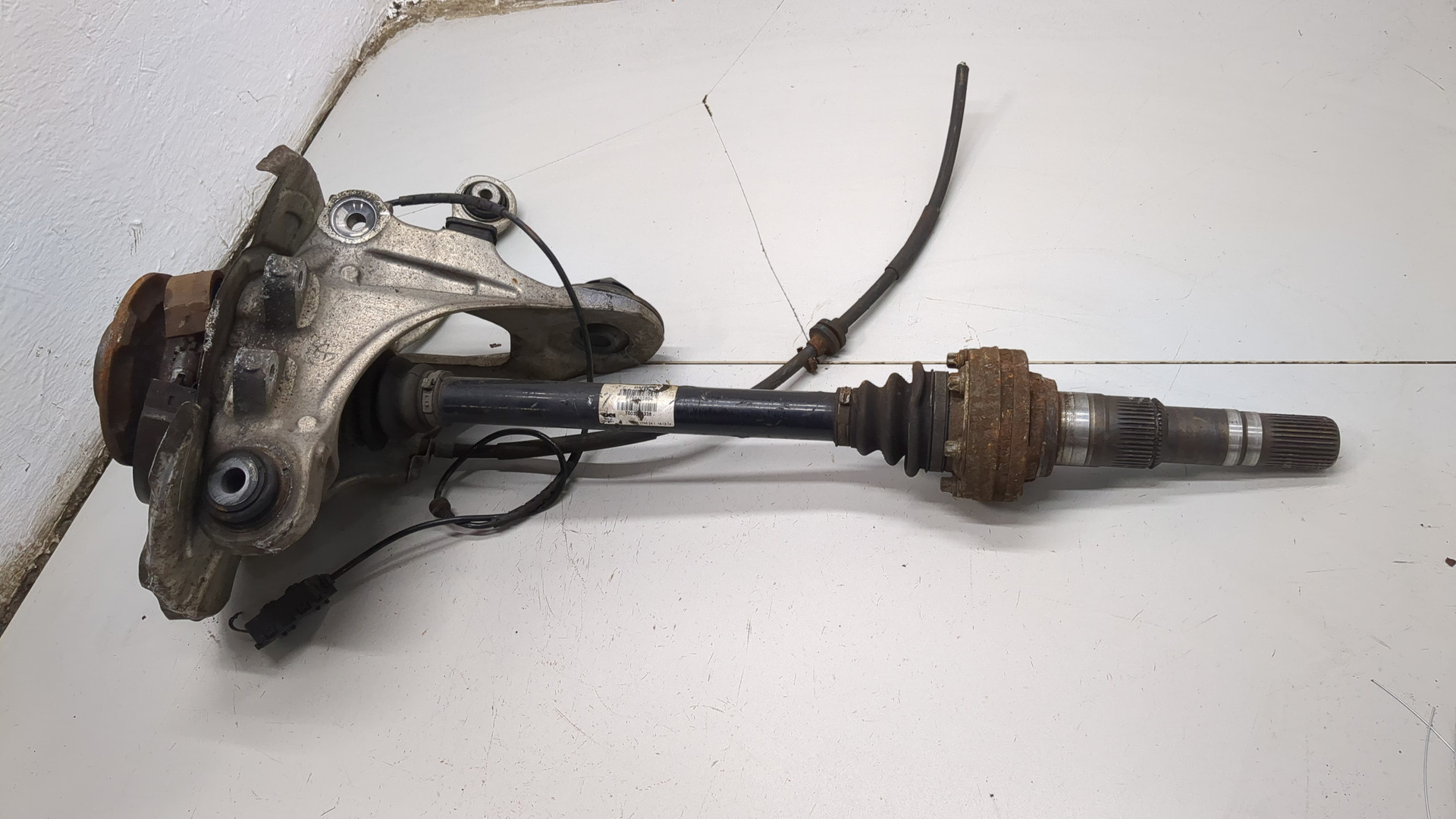 Кулак поворотный задний левый