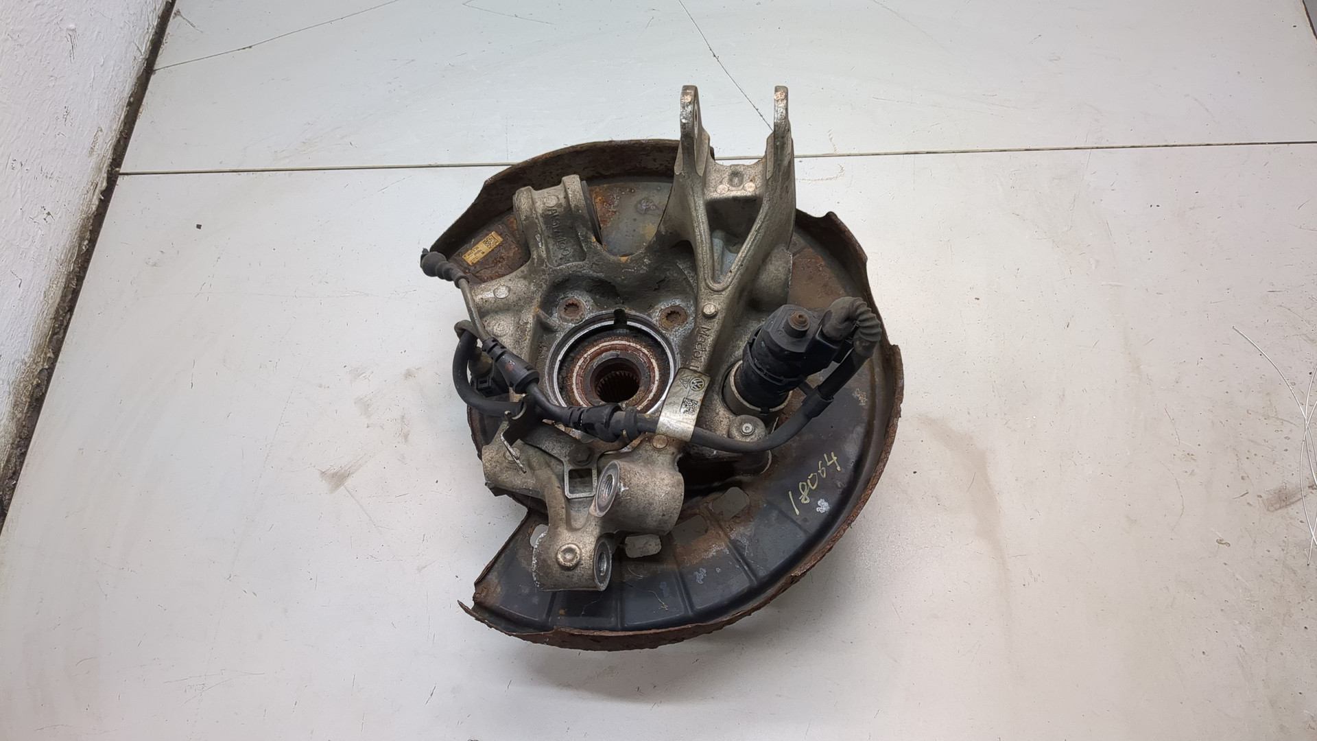 Кулак поворотный задний левый