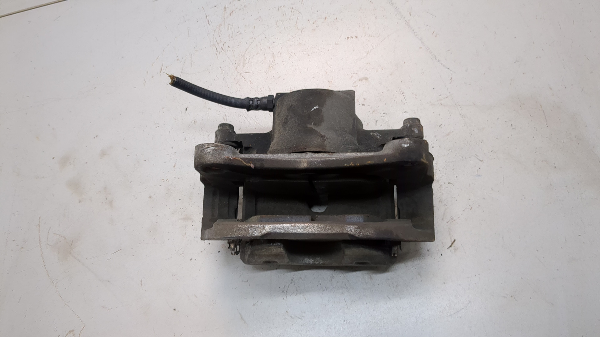 Суппорт передний левый