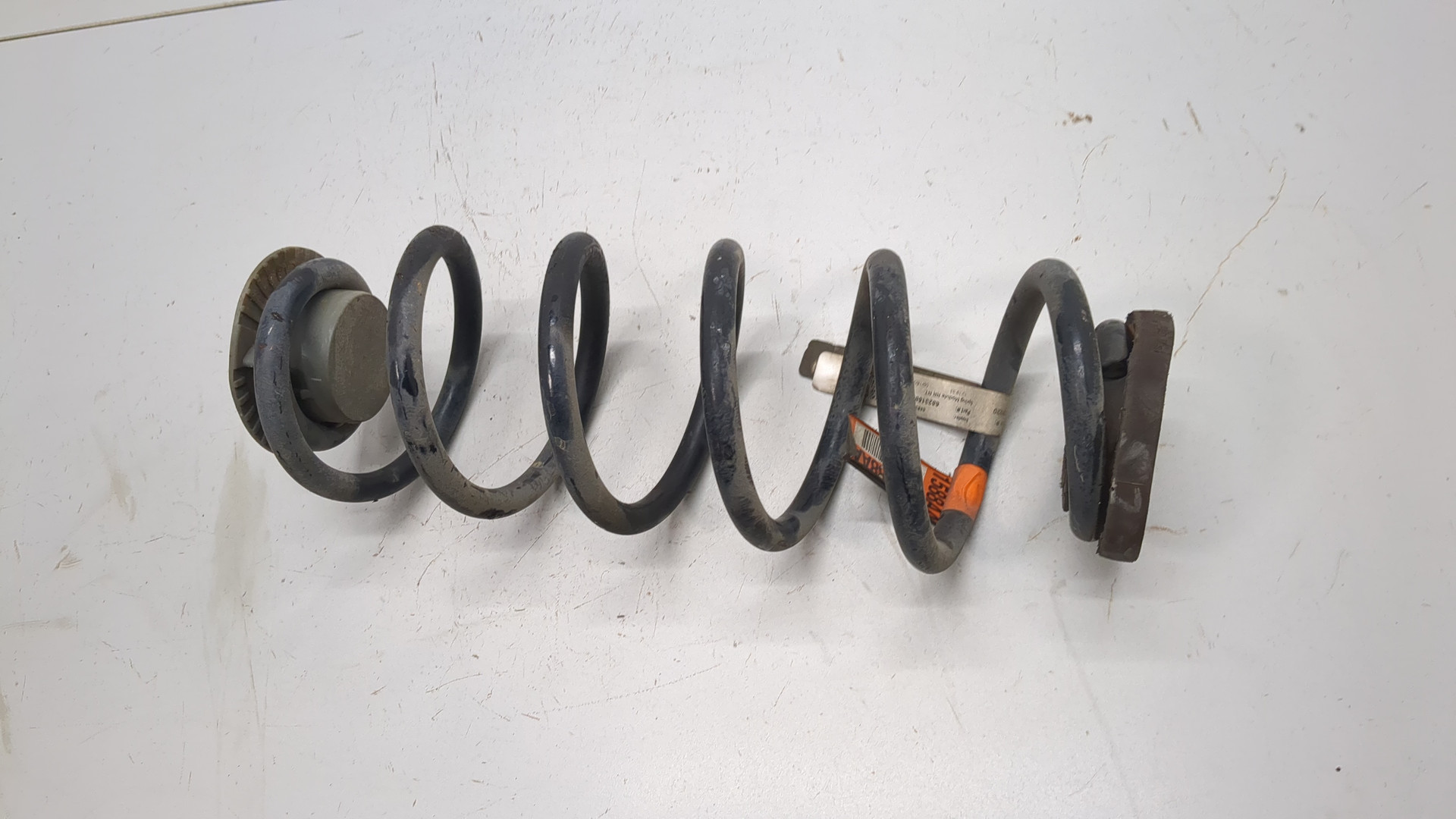 Пружина задняя