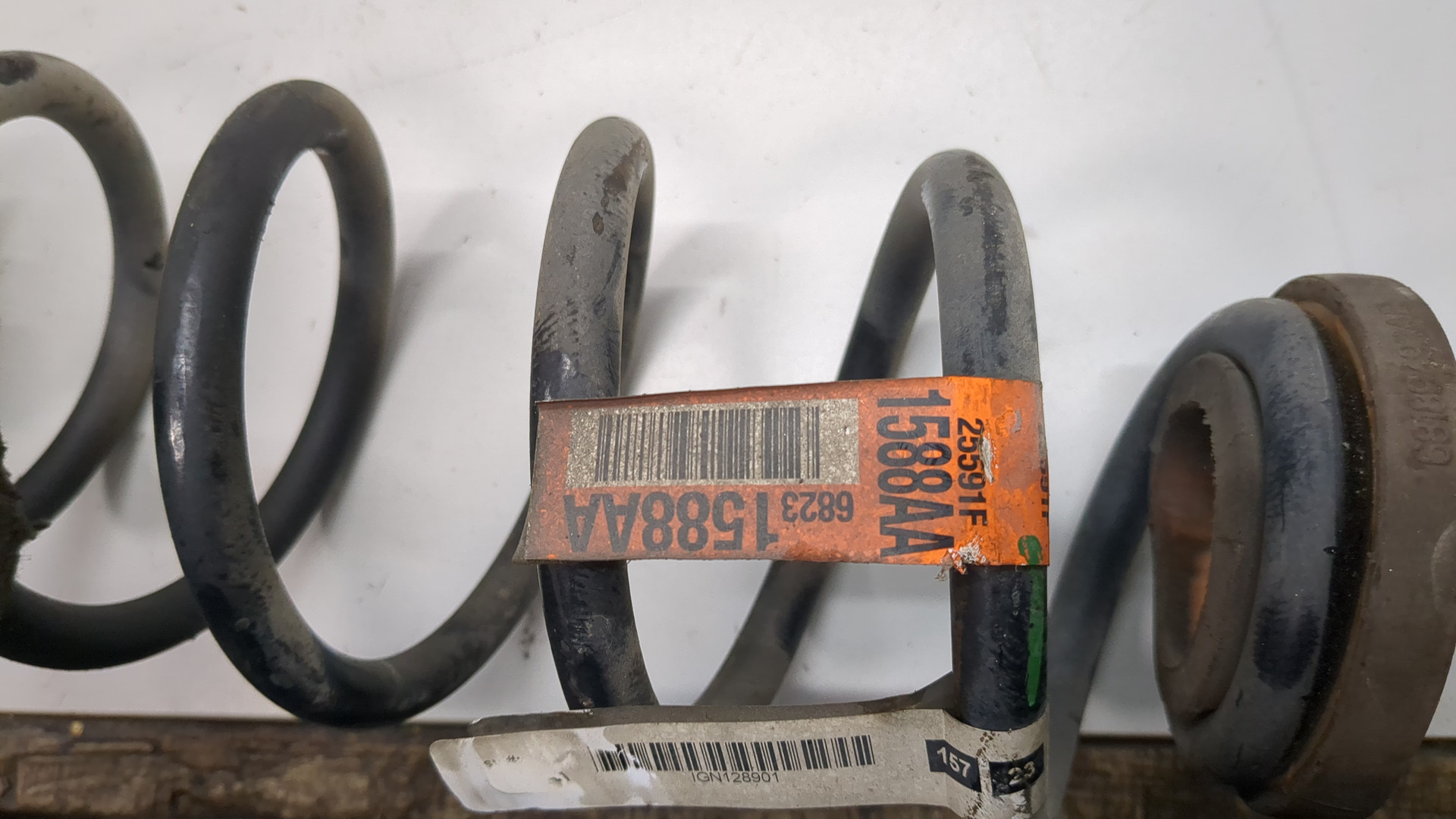 Пружина задняя