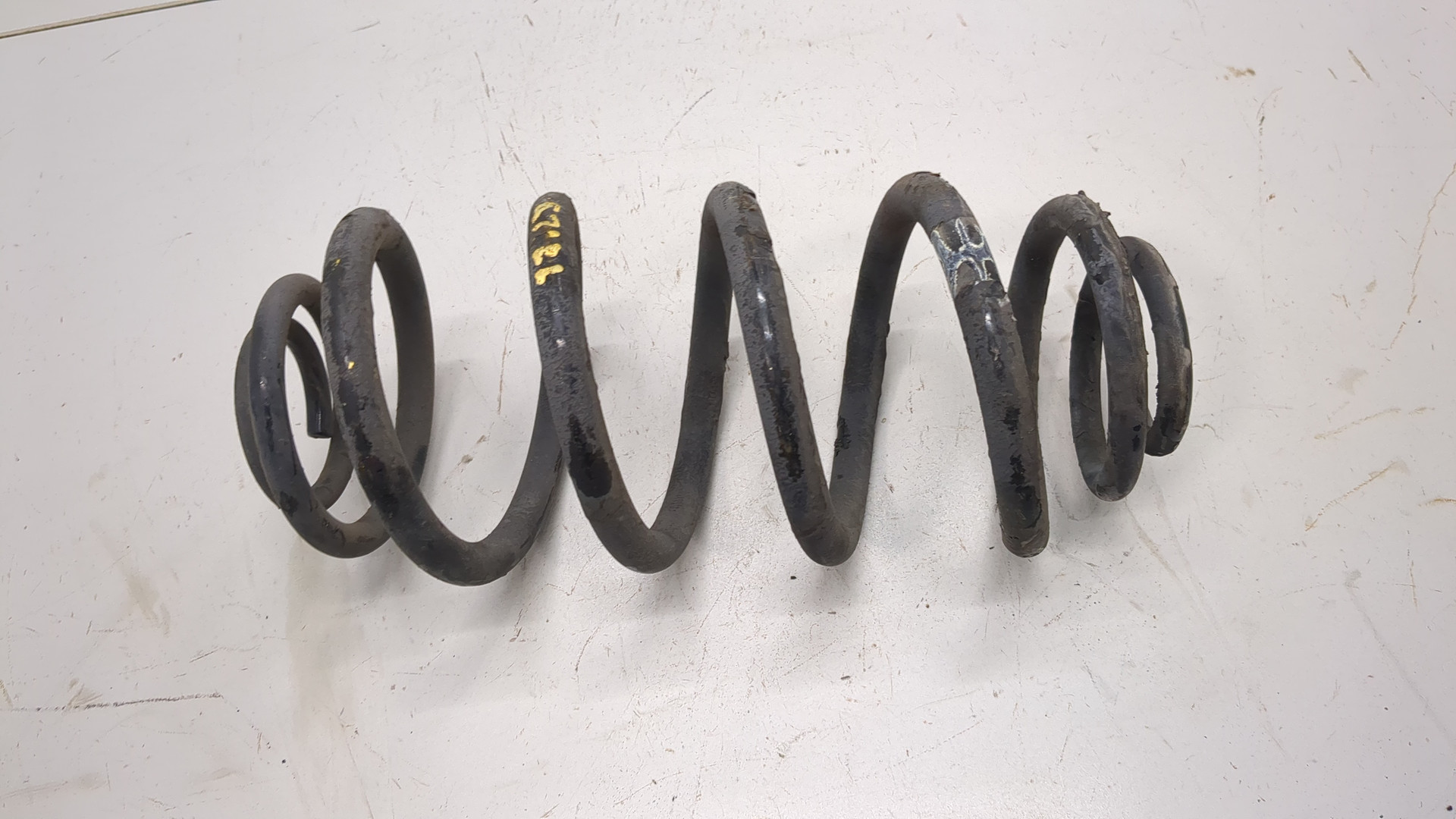 Пружина задняя