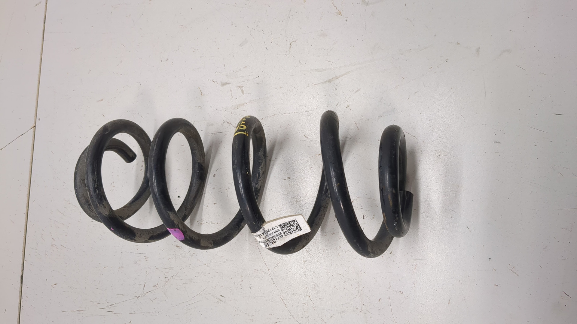 Пружина задняя