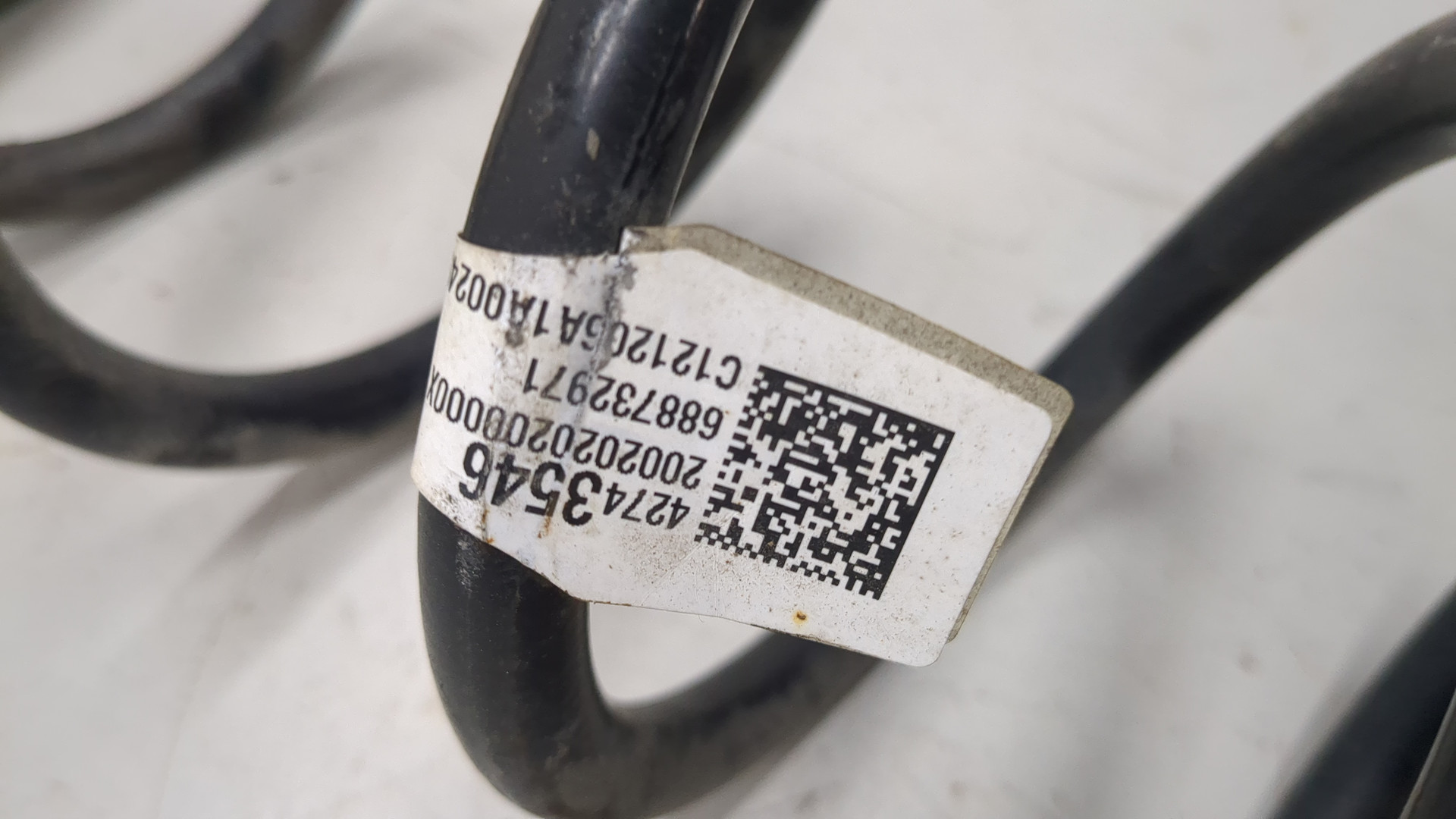 Пружина задняя