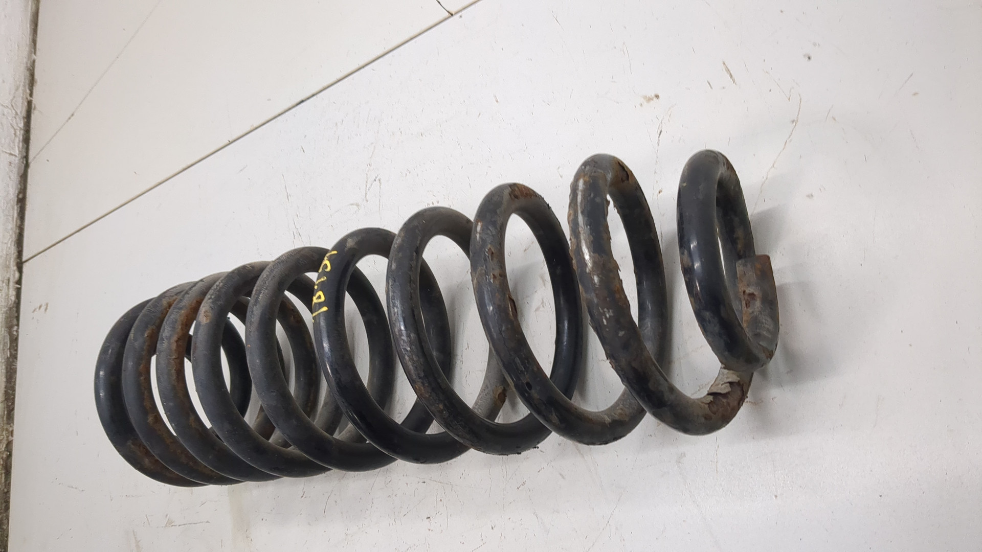 Пружина задняя