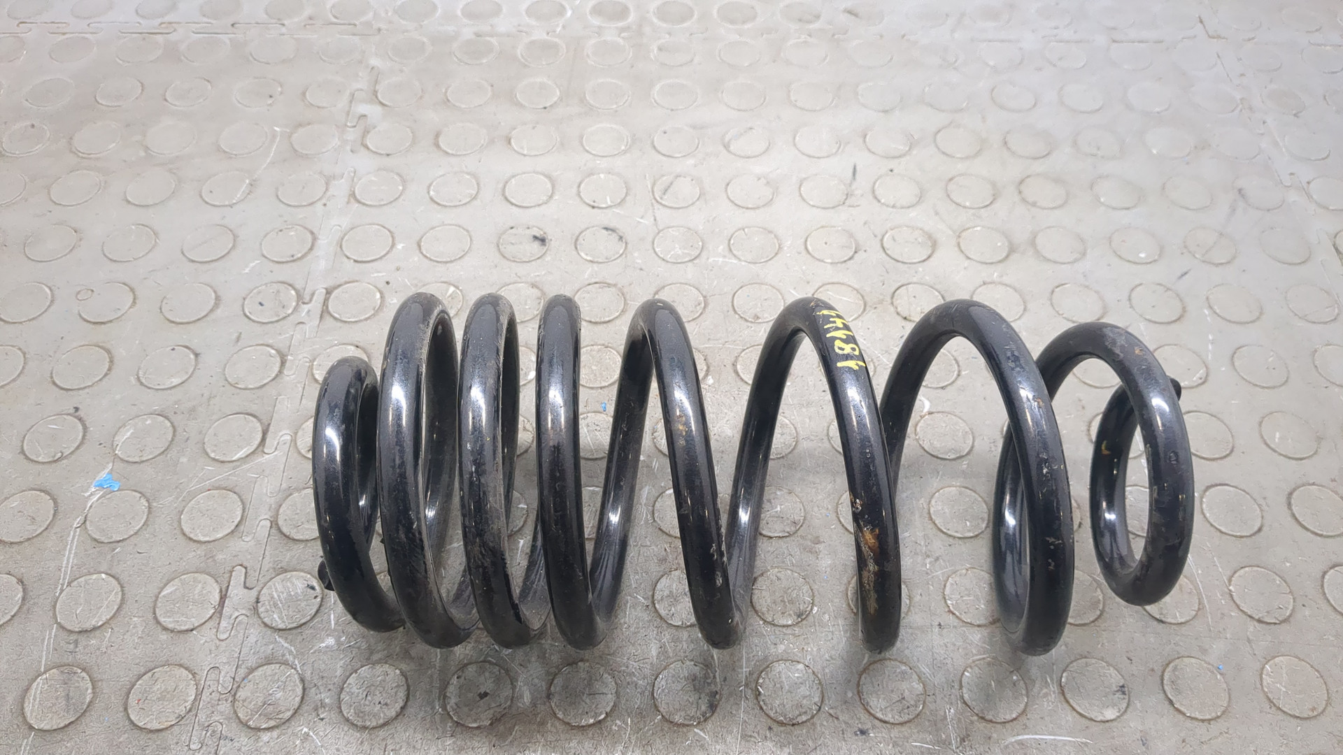 Пружина задняя