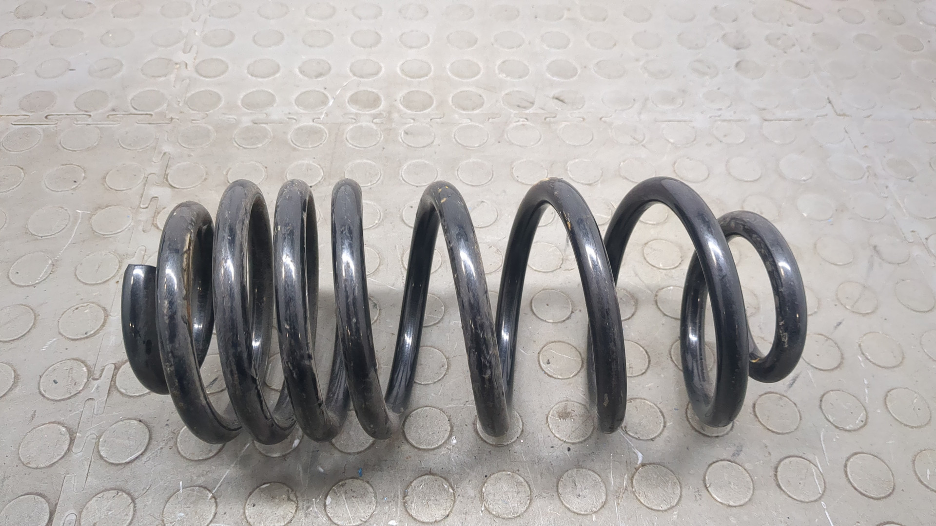 Пружина задняя