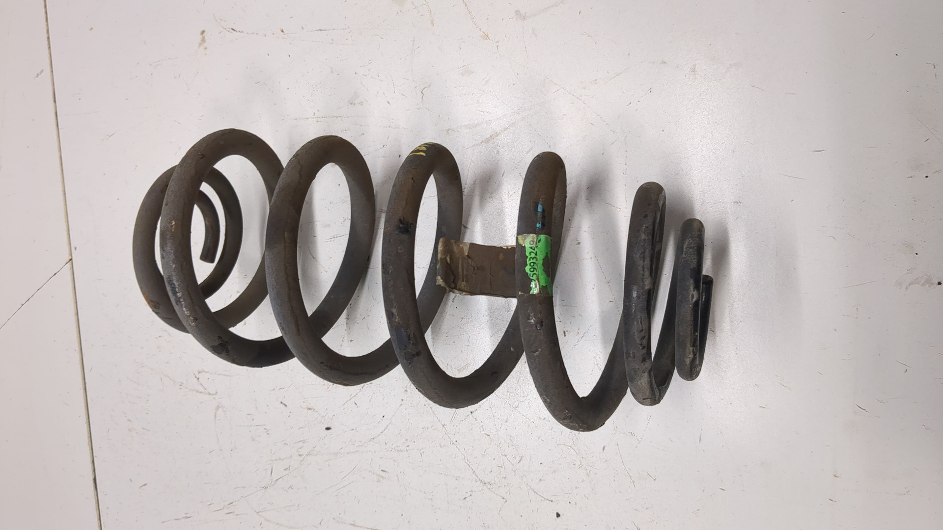 Пружина задняя