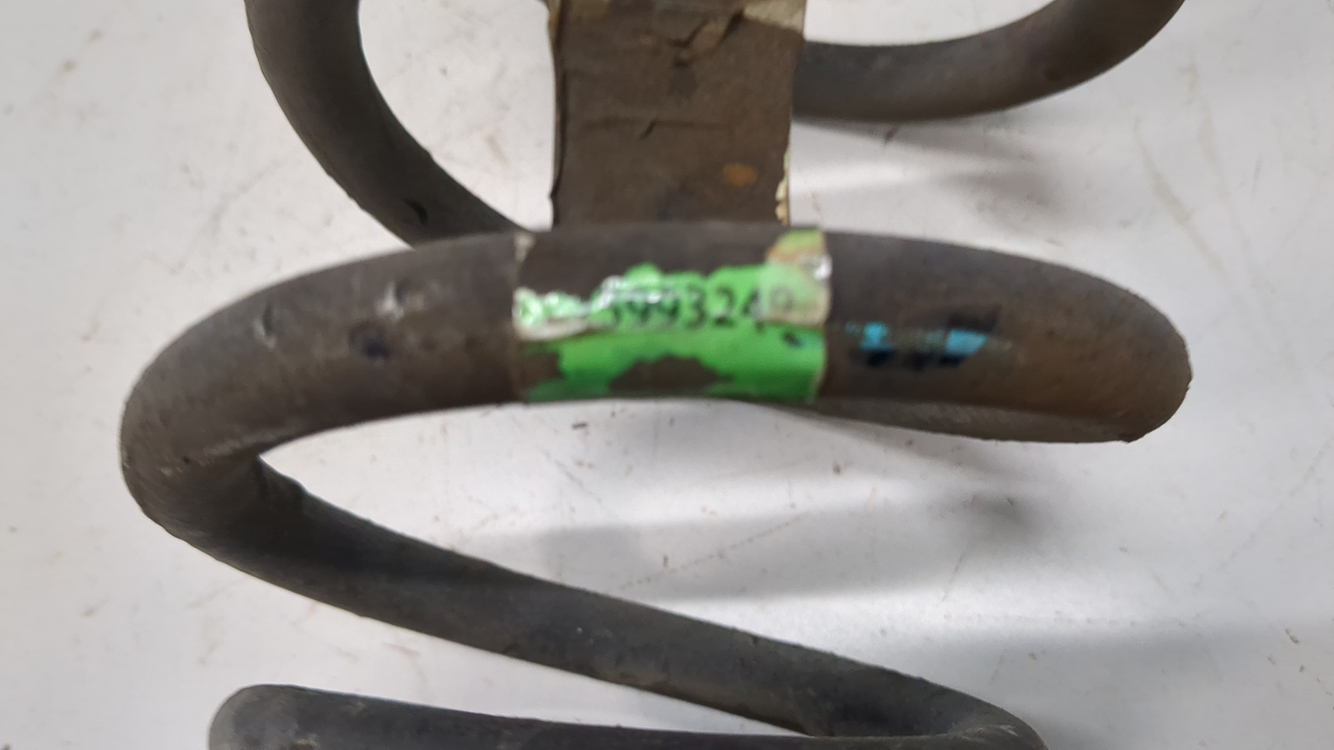 Пружина задняя