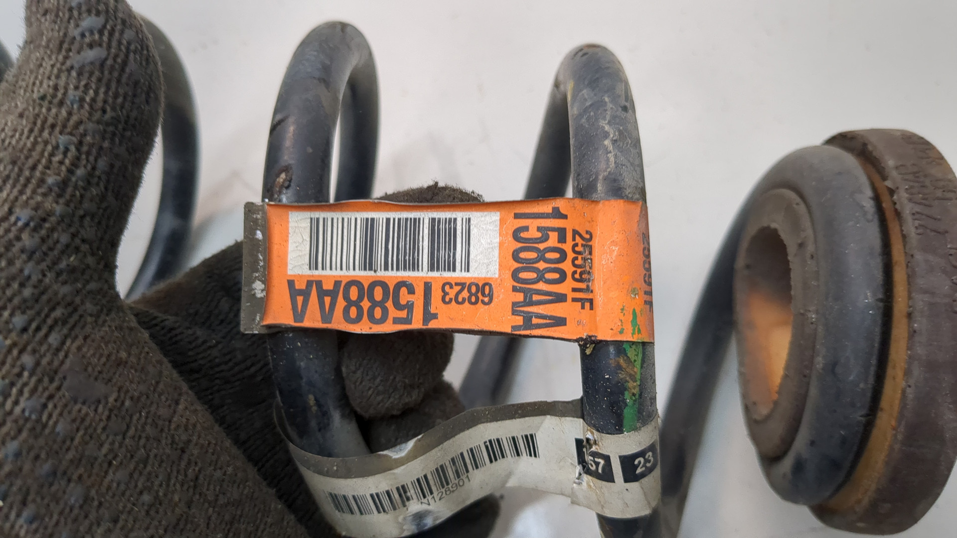 Пружина задняя