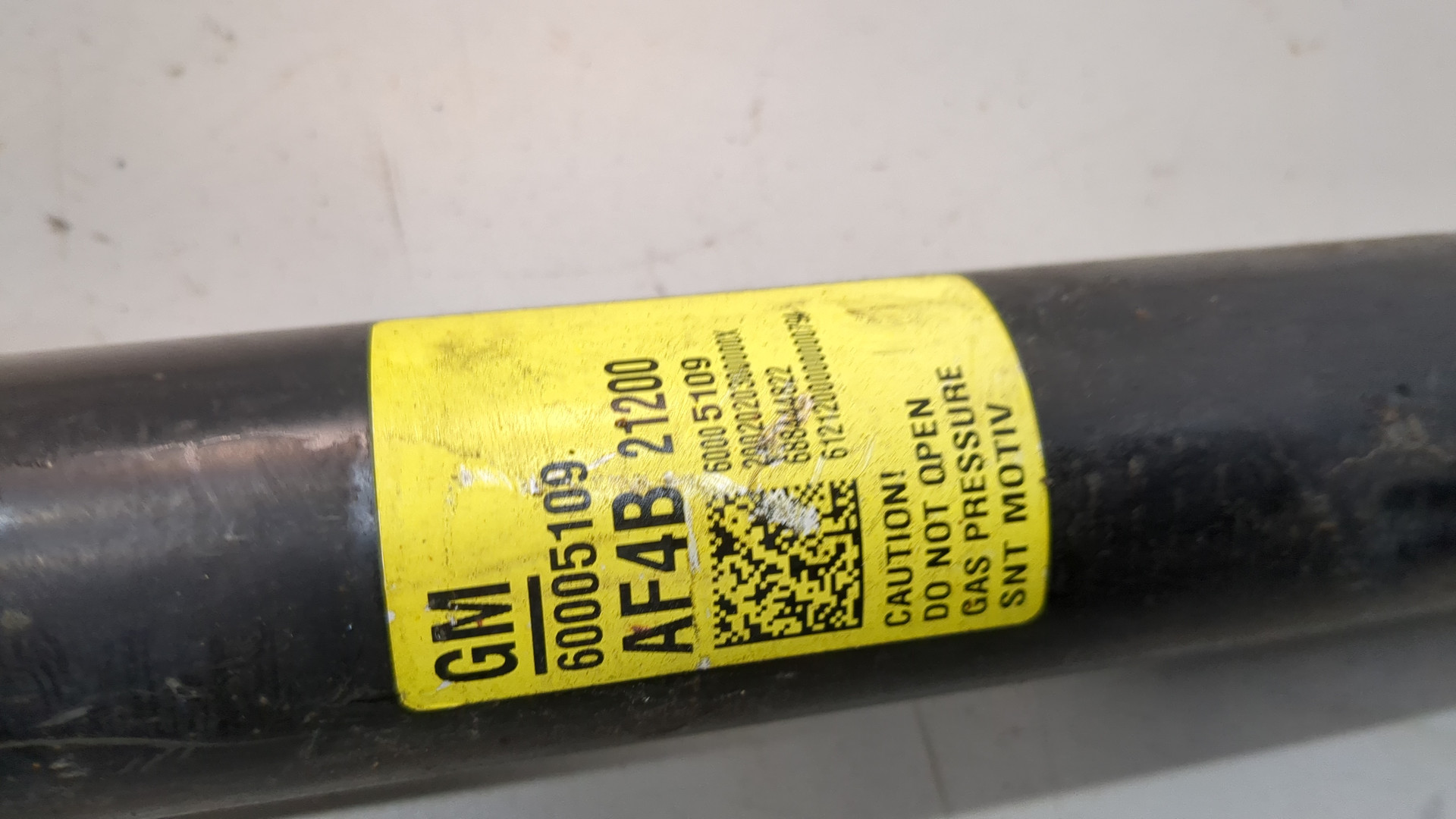 Амортизатор задний левый