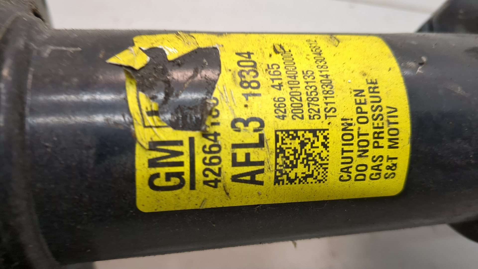 Амортизатор передний левый