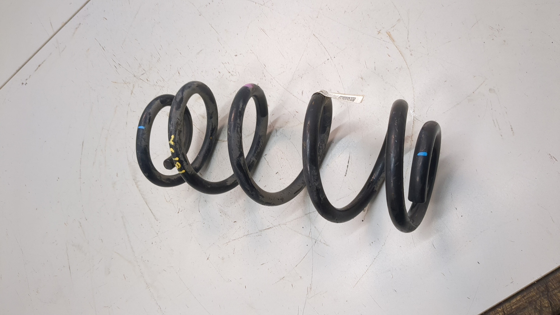 Пружина задняя