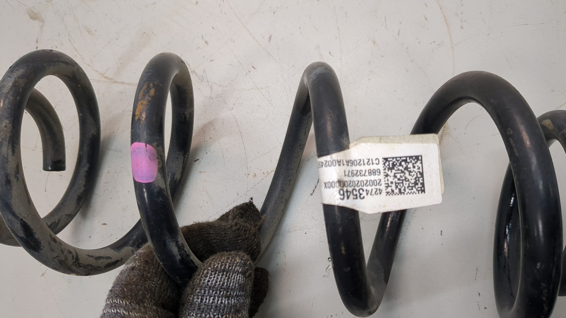 Пружина задняя