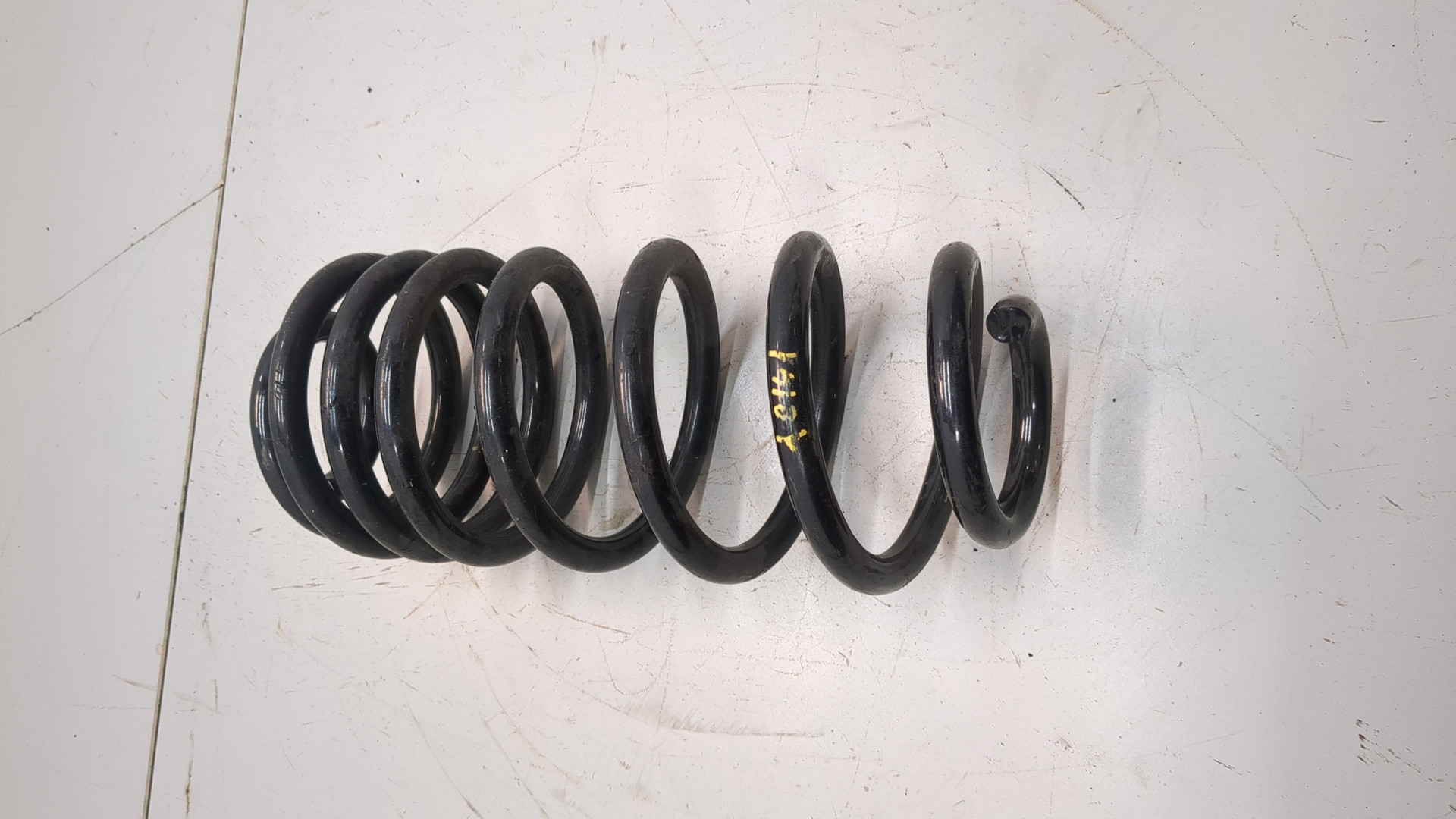 Пружина задняя