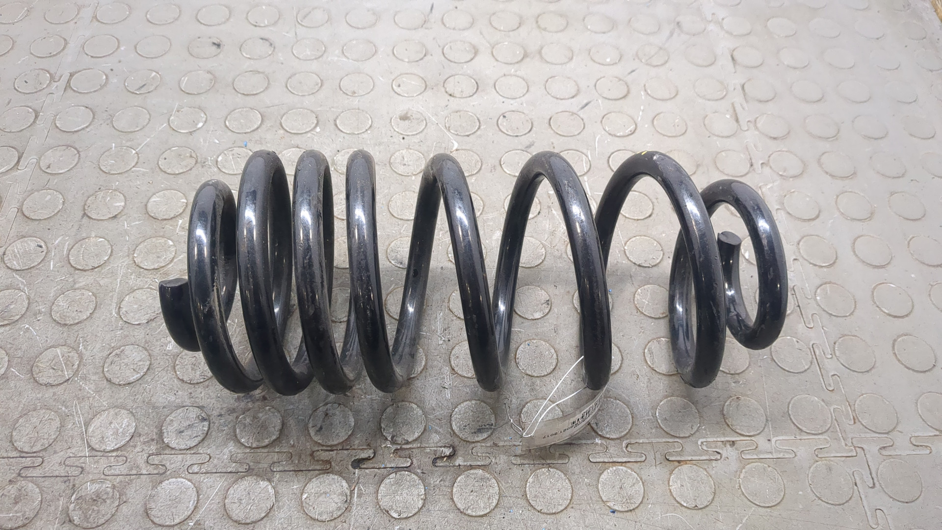 Пружина задняя