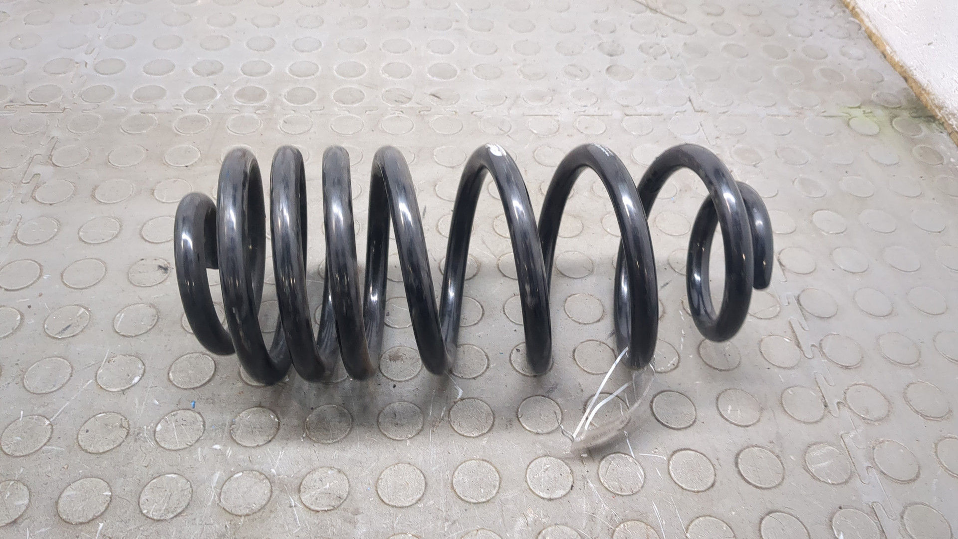 Пружина задняя