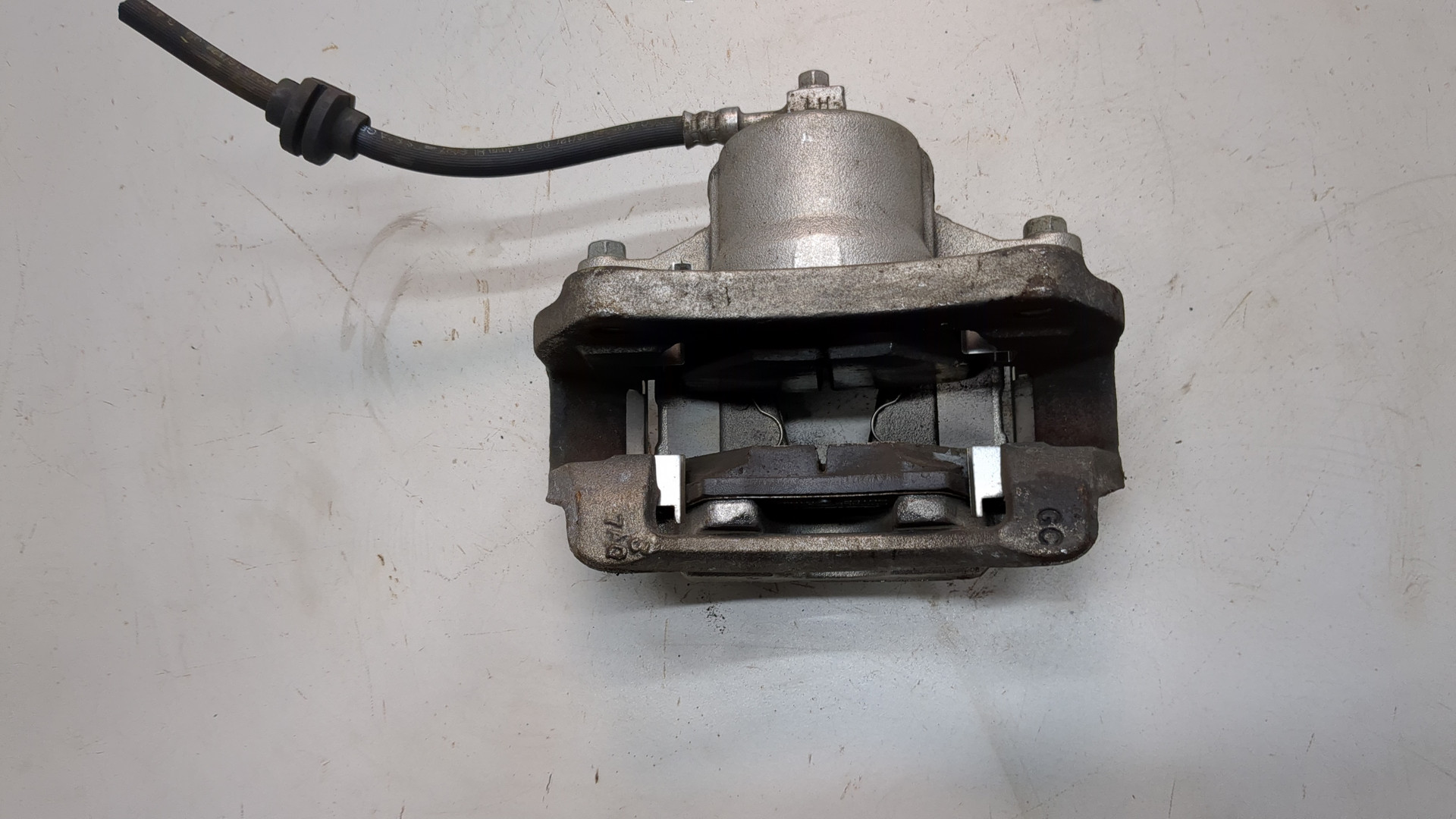 Суппорт передний левый