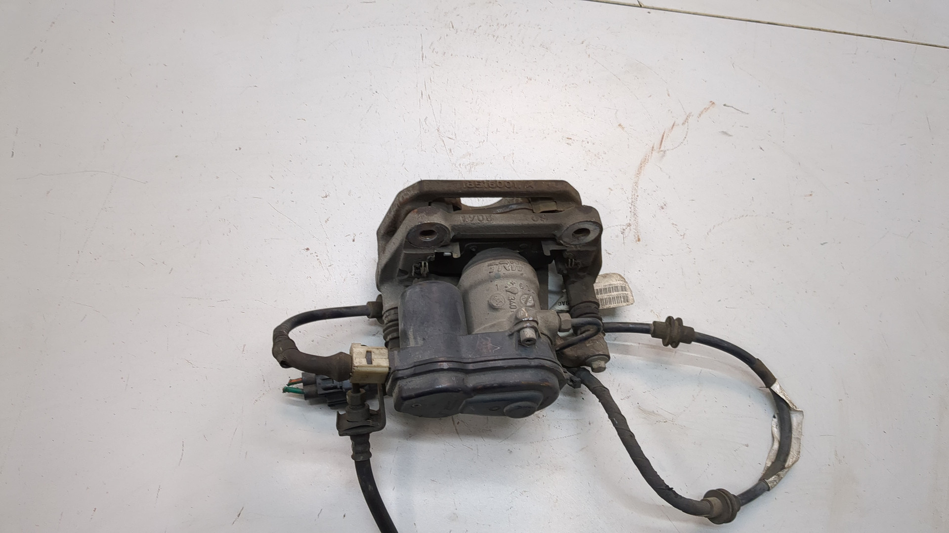 Суппорт задний левый