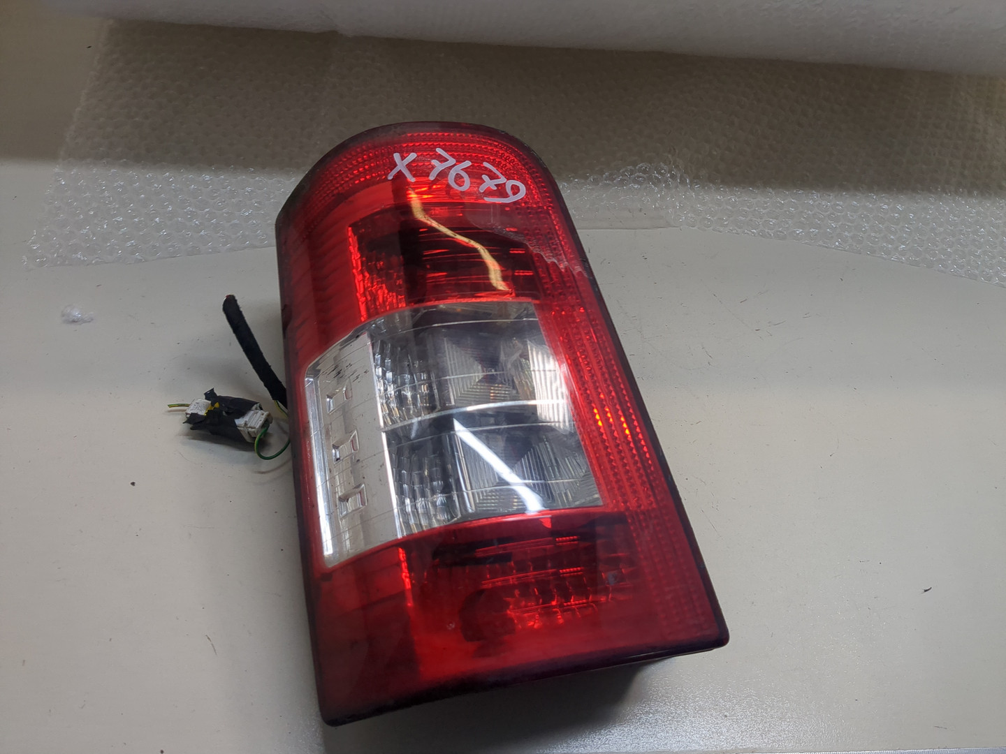 Фонарь задний левый