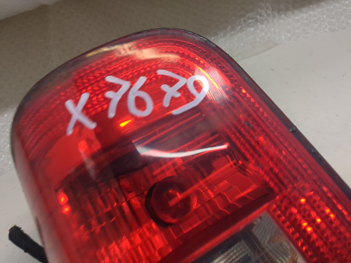 Фонарь задний левый