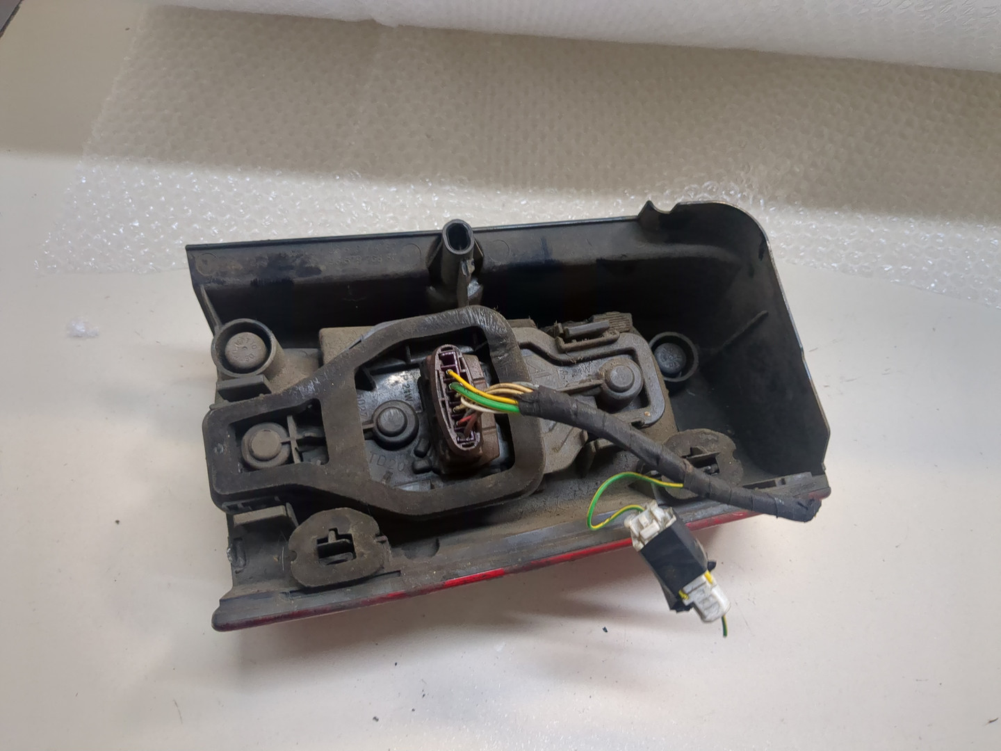 Фонарь задний левый