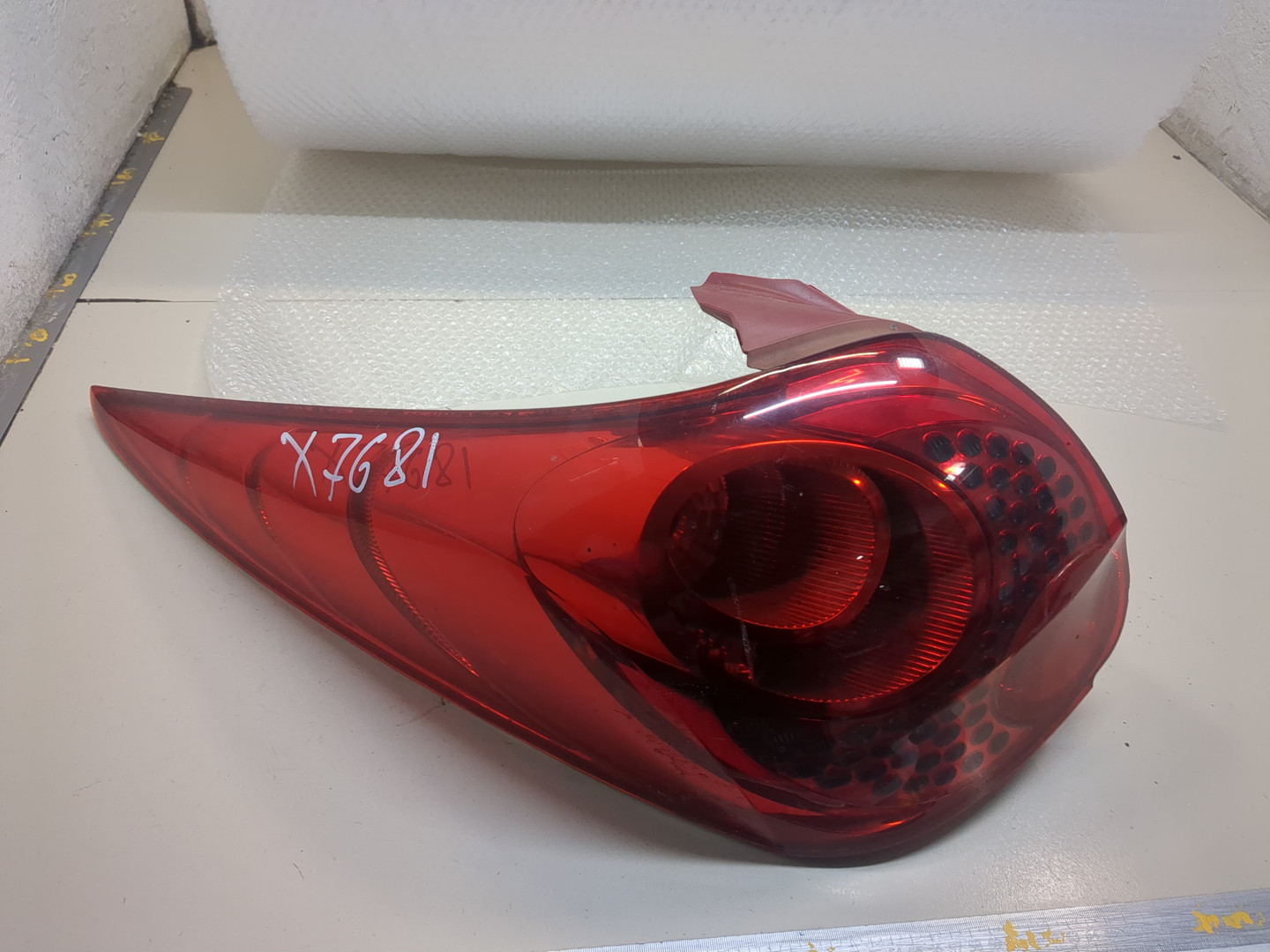 Фонарь задний левый