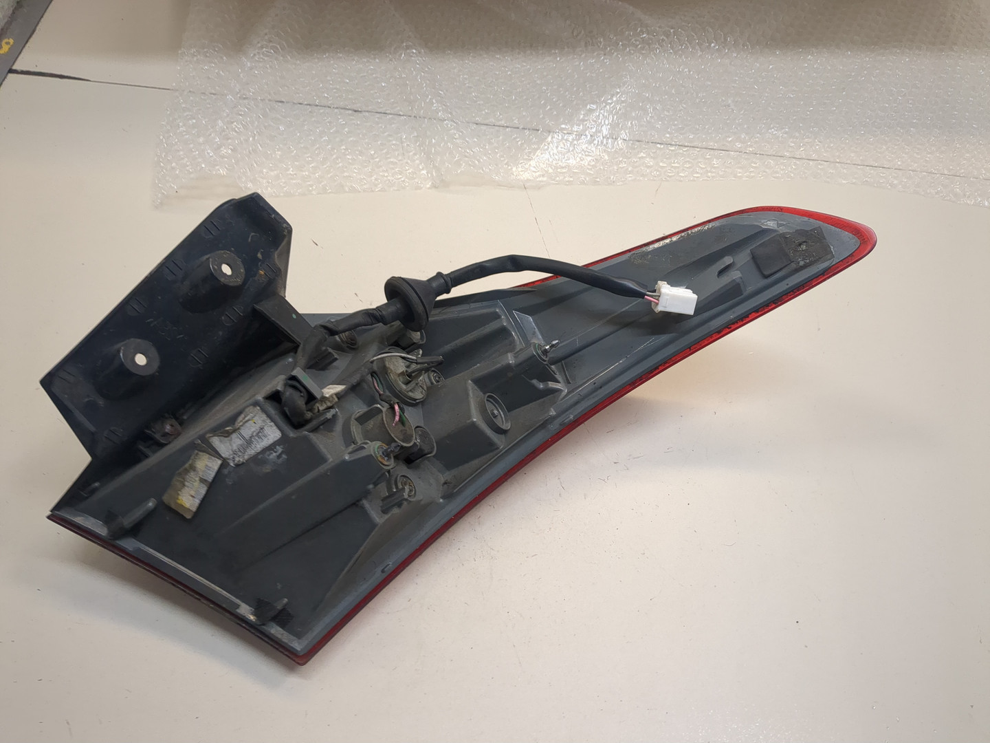 Фонарь задний левый