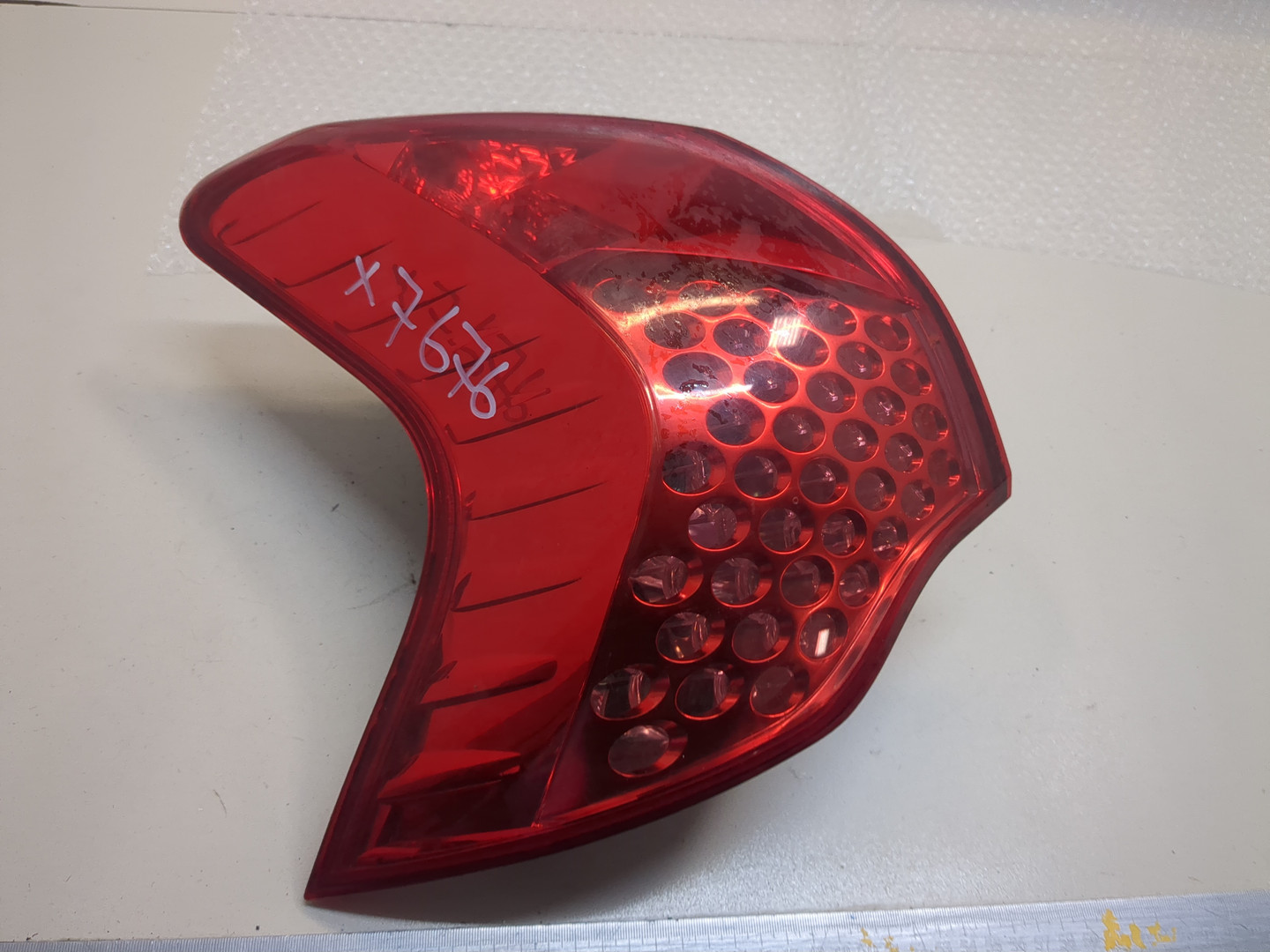 Фонарь задний левый