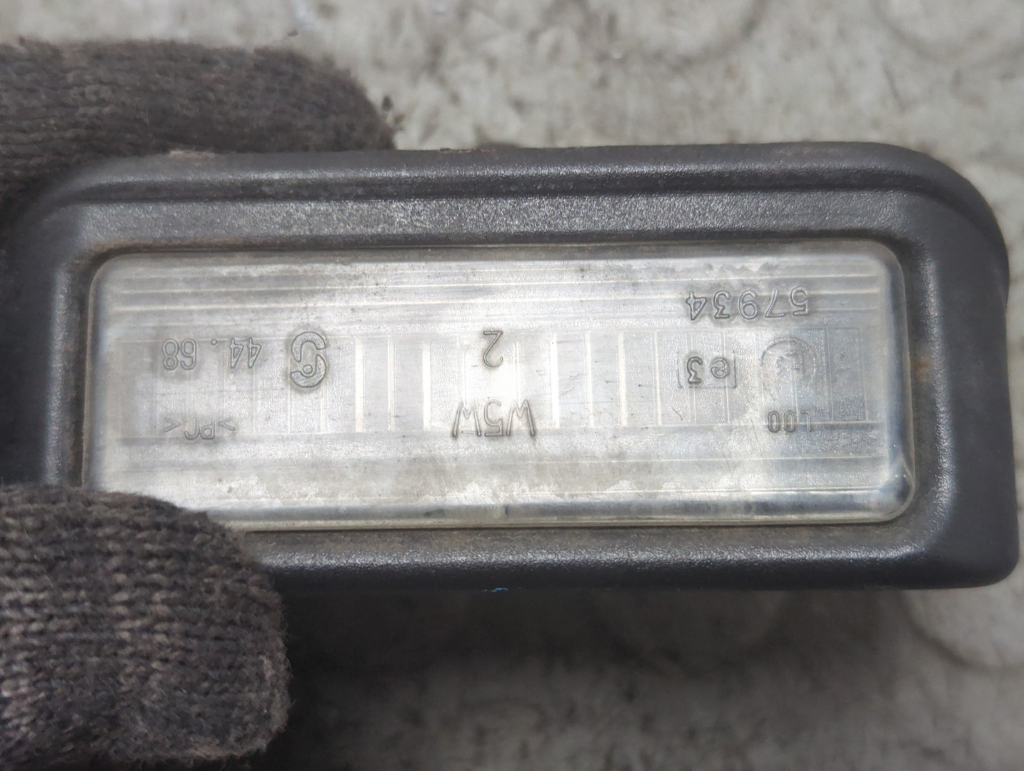 Фонарь подсветки номера