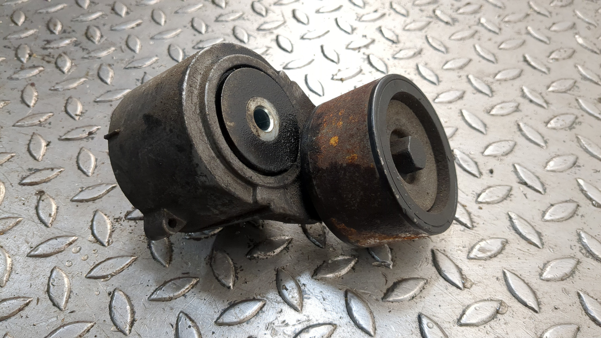 Натяжитель ремня