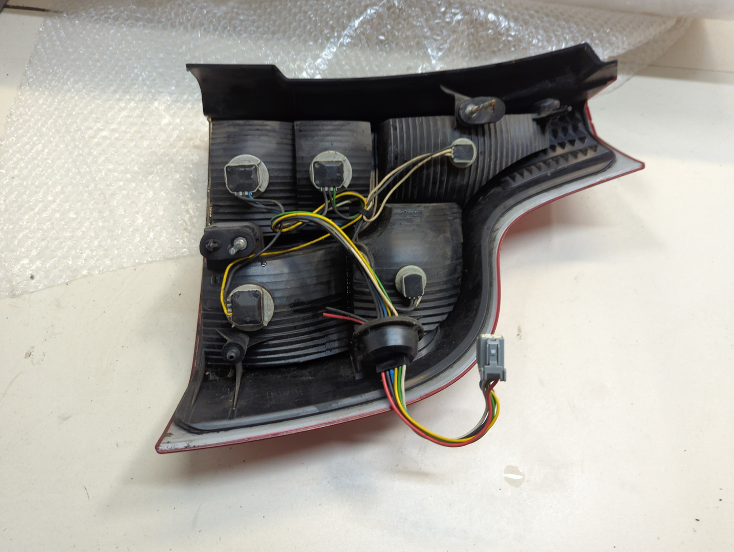 Фонарь задний левый