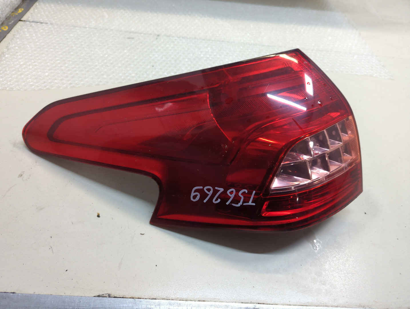 Фонарь задний левый