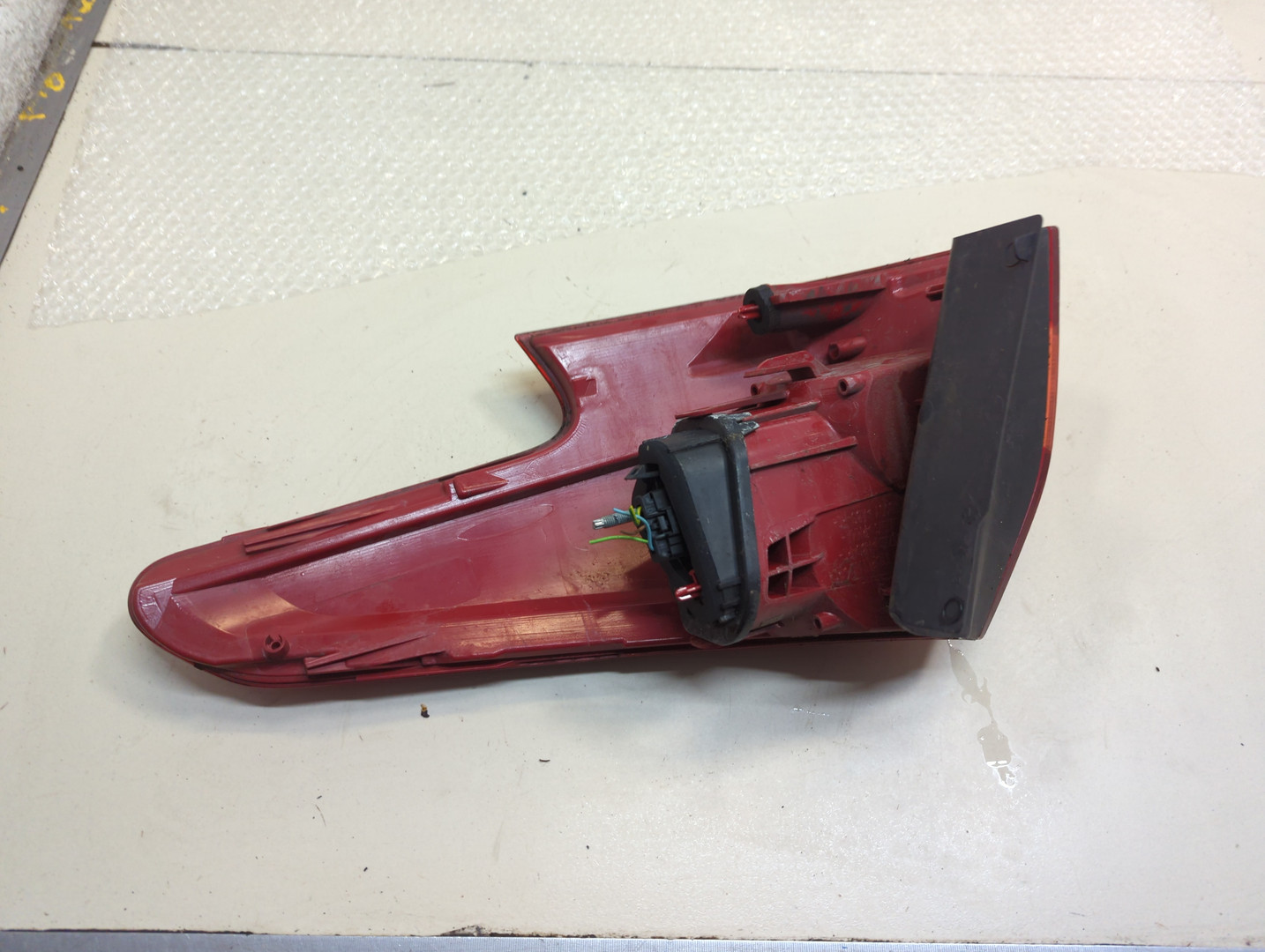 Фонарь задний левый