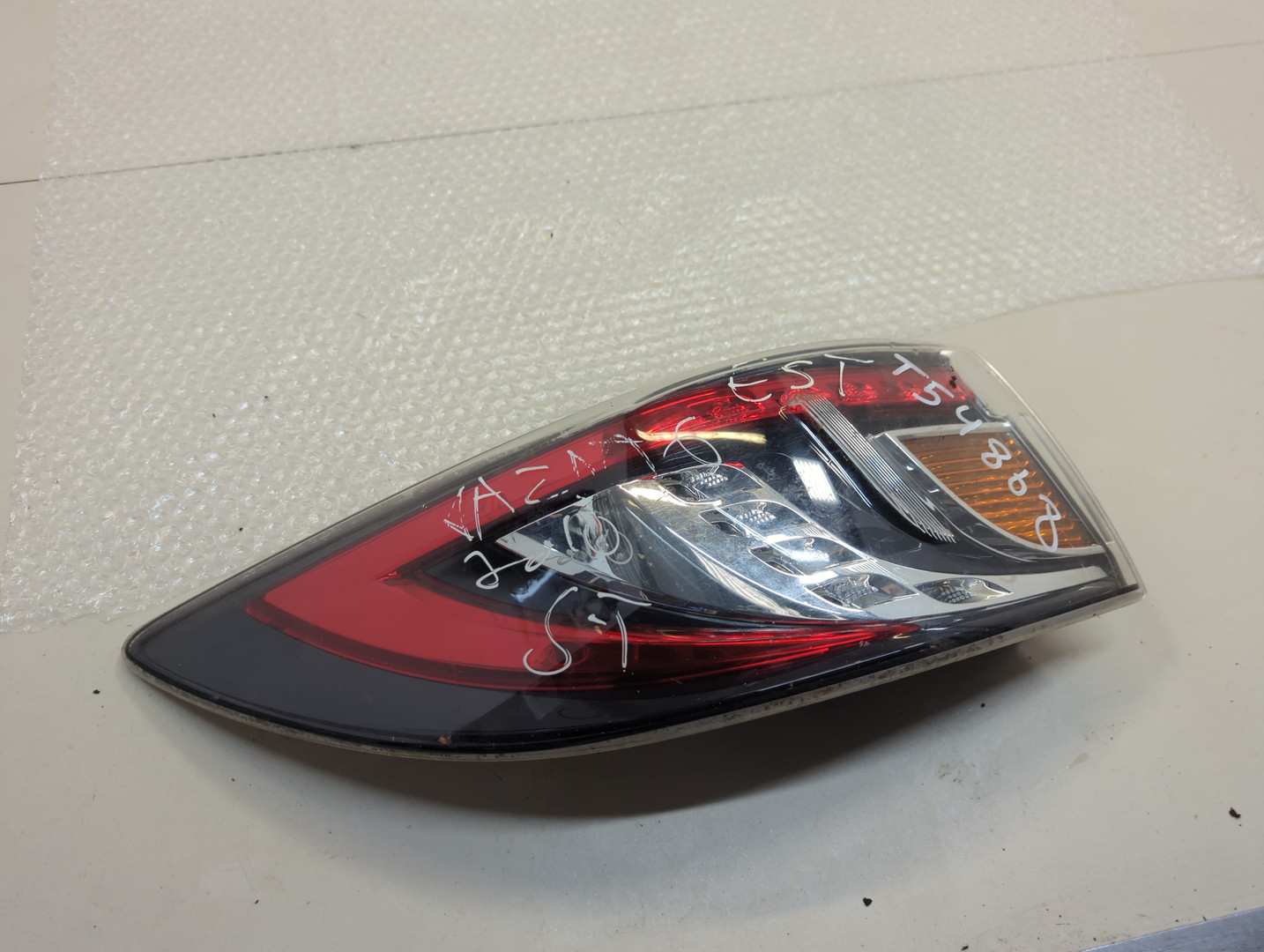 Фонарь задний левый