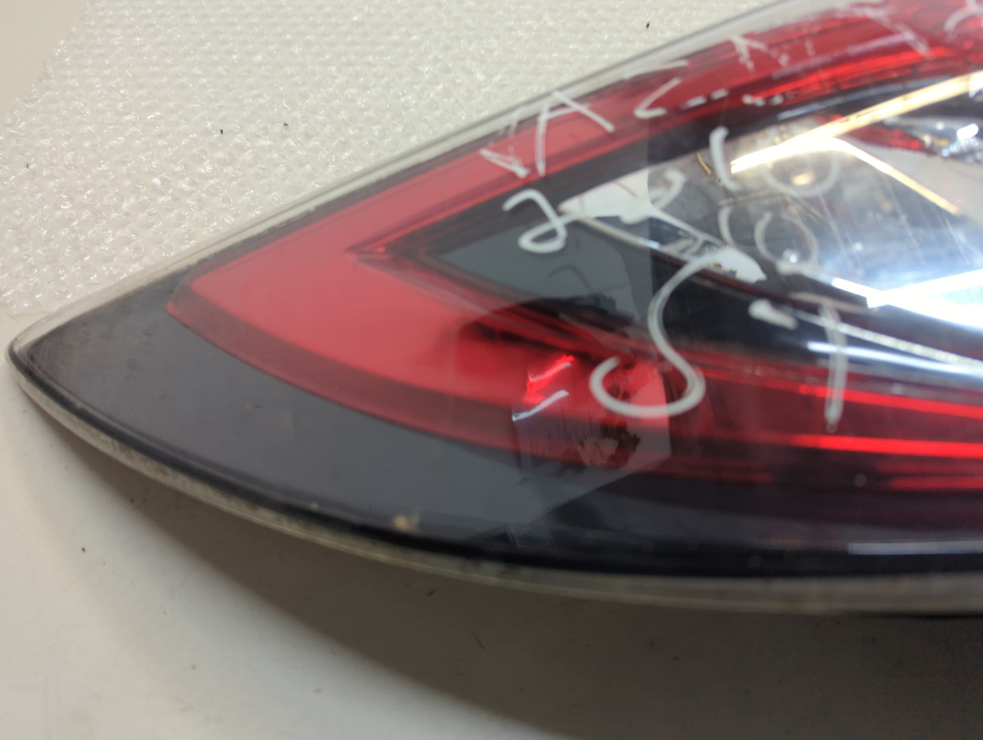 Фонарь задний левый