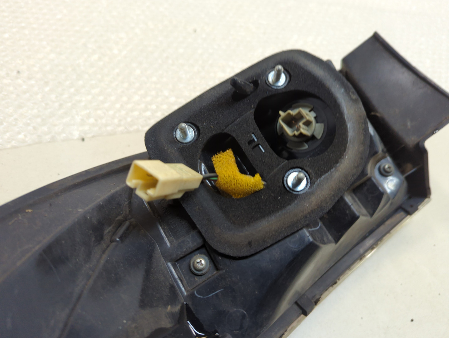 Фонарь задний левый