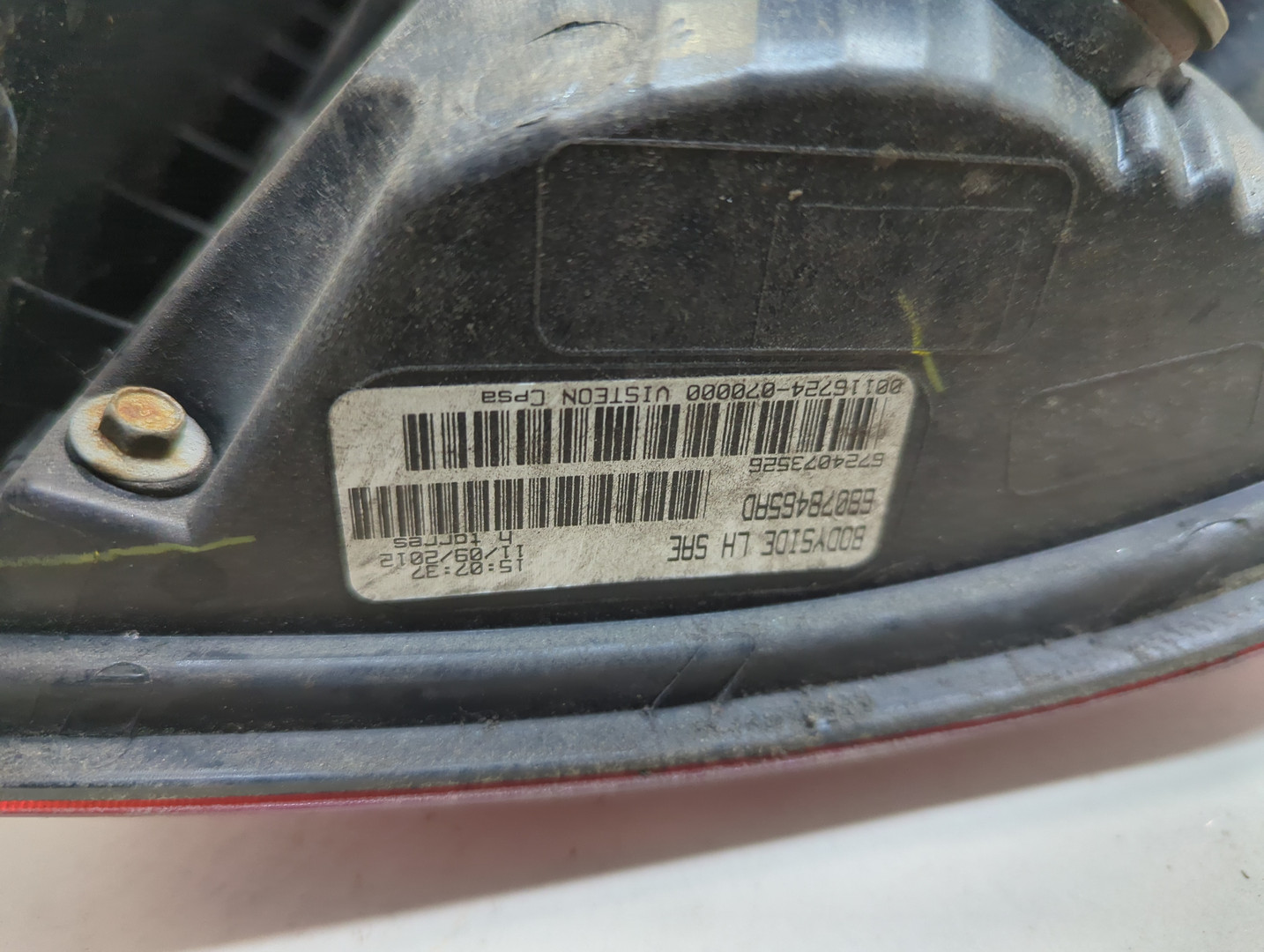 Фонарь задний левый